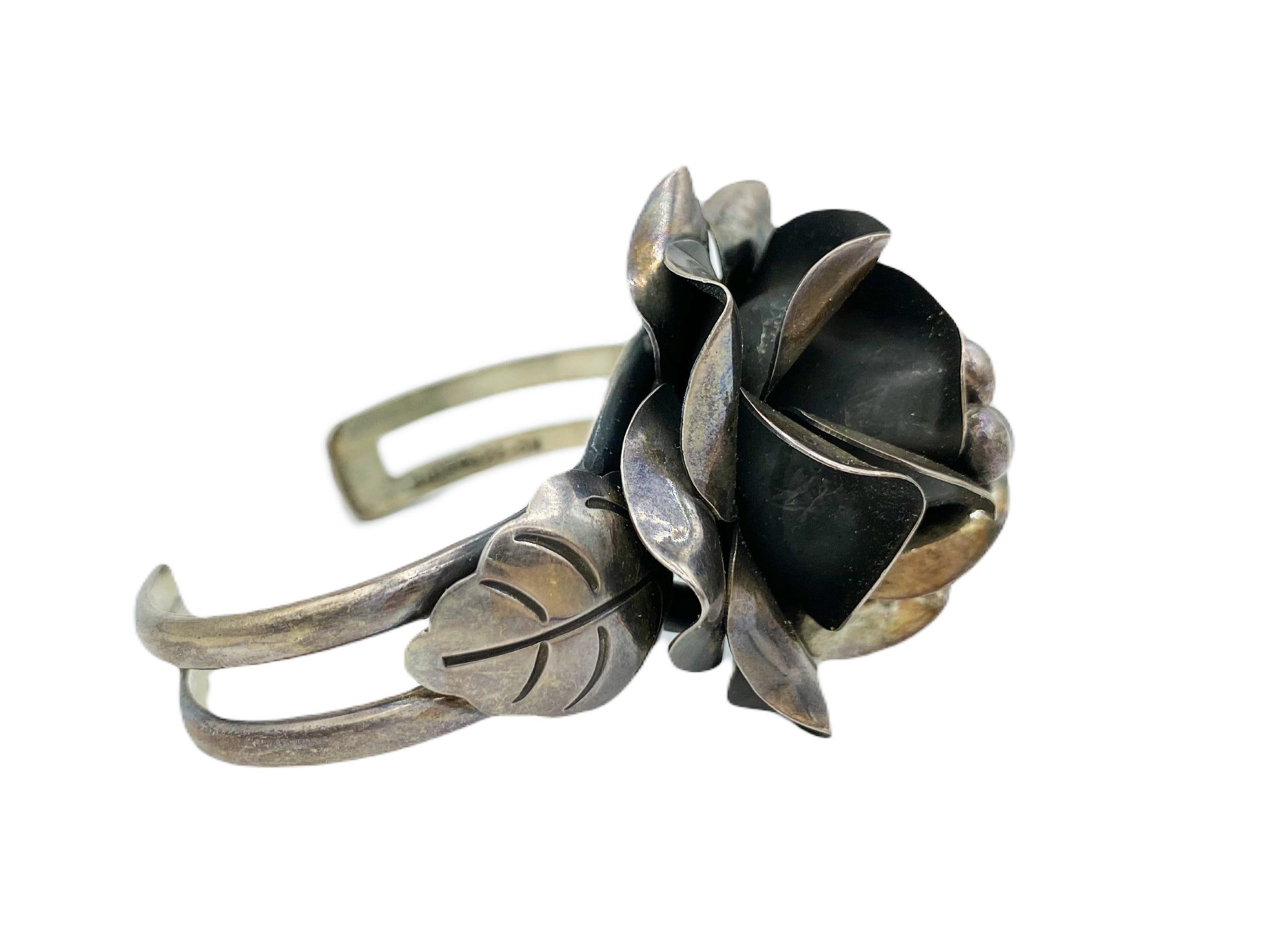 You'll love this remarkable Vintage Sterling Silver Rose 3-Dimensional Flower Mexico Statement Cuff Bracelet, a wearable work of art that showcases the beauty of Mexican silver craftsmanship. Handmade with meticulous attention to detail, this cuff