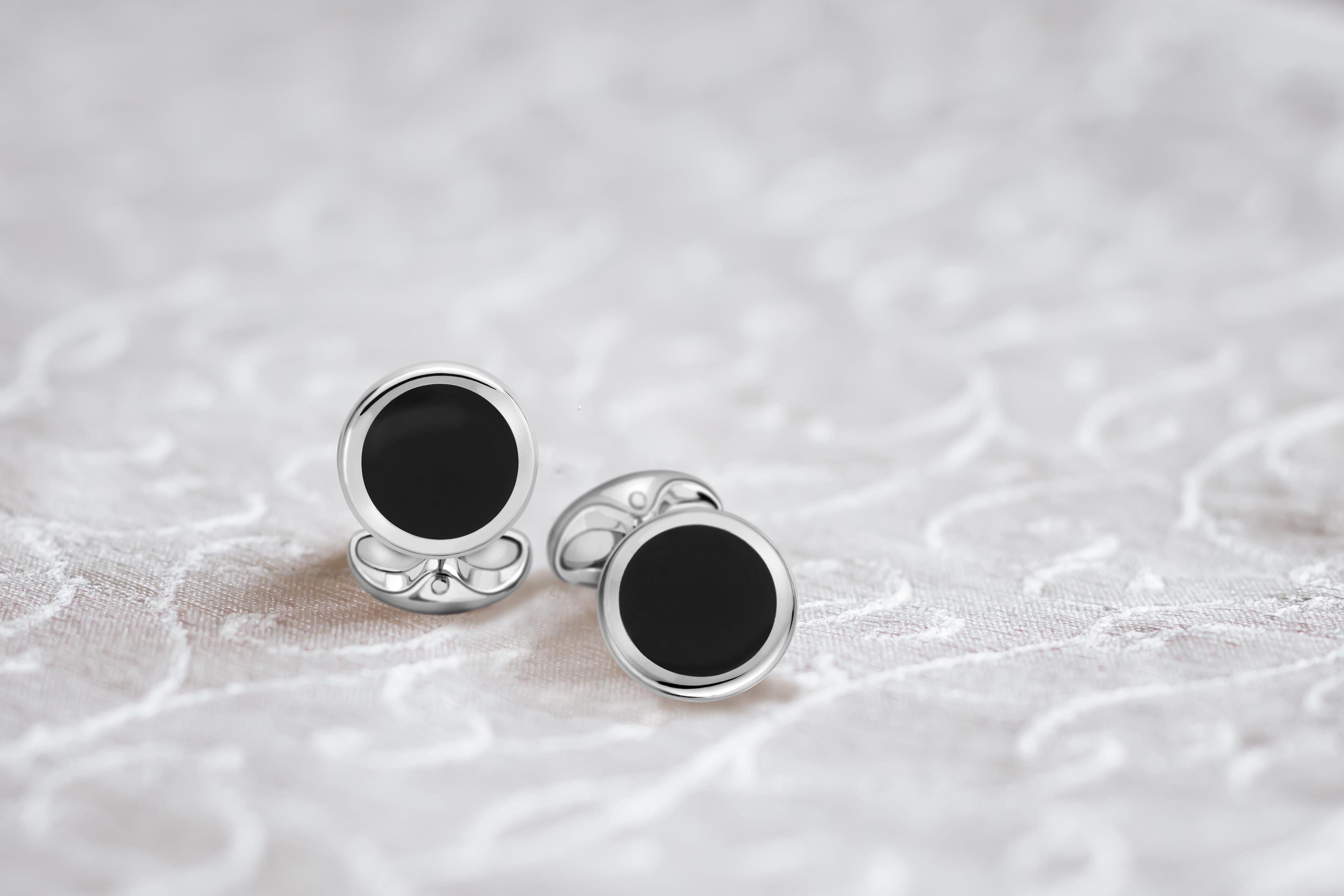 DEAKIN & FRANCIS, Piccadilly Arcade, London

Onyx is a semi-precious stone which was very popular with the Ancient Greeks and Romans. Choose these sterling silver, round cufflinks with striking black onyx inlay for both a classic and contemporary