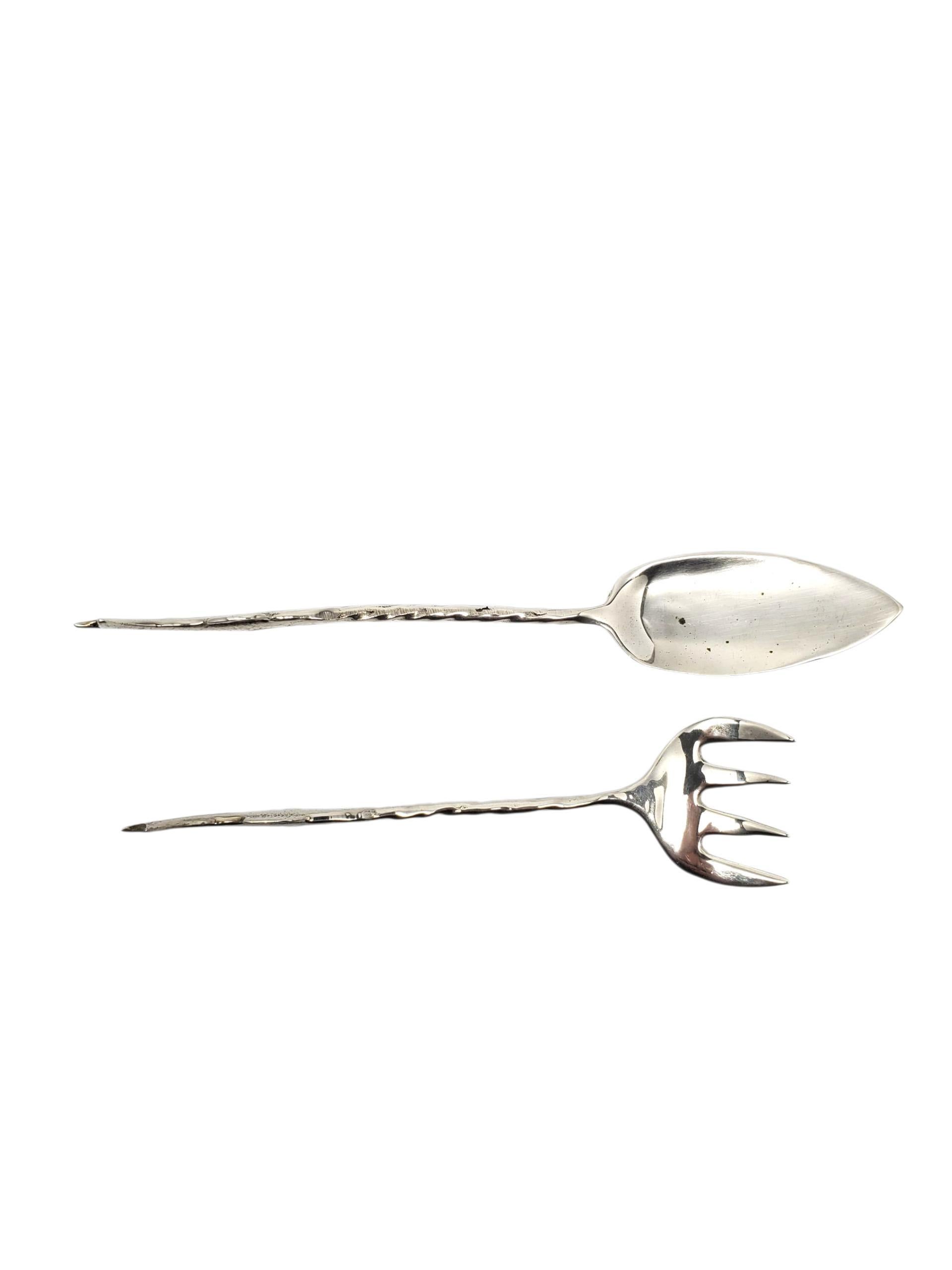 Sterling Silver Sardine Fork & Spoon Serving Set -

These vintage sterling silver sardine fork & spoon set features sculpted fish handles and whimsical design.

Size: Fork approx. 5 in. 
		Spoon  approx. 6 in. 

Weight: 46.50 gr./ 29.9