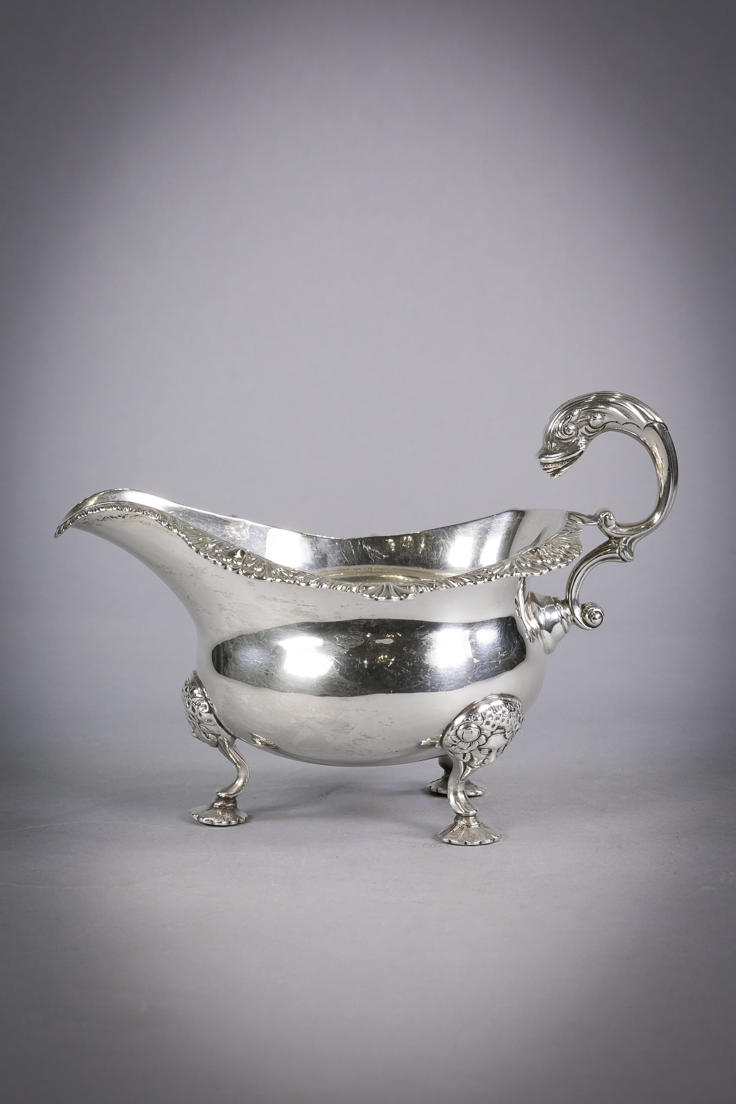 Engraved on base 'Reproduction sauce boat made in London by Wm. Bateman, 1820-1821, Sterling'.