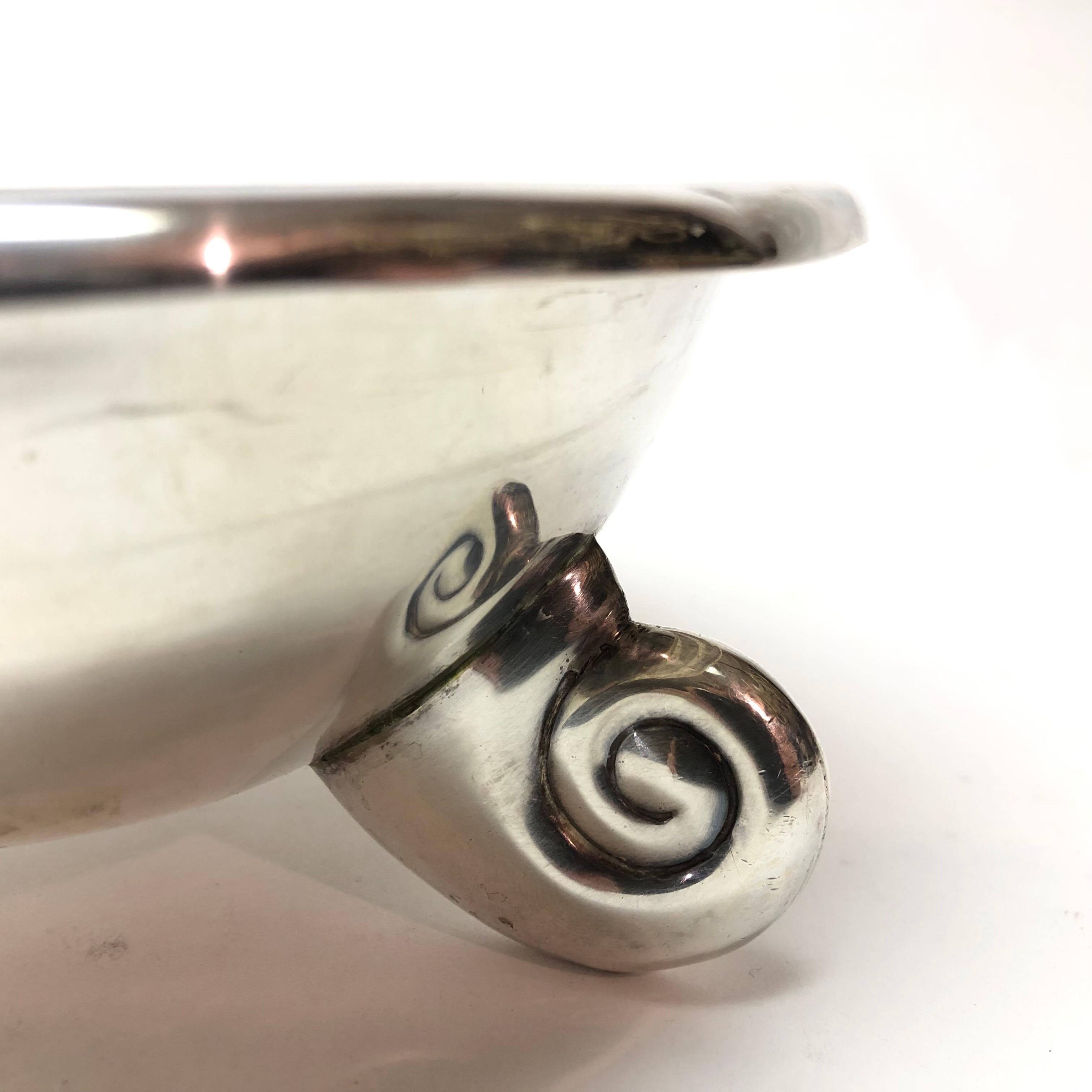 Sterling silver scroll-footed bowl

Marked 