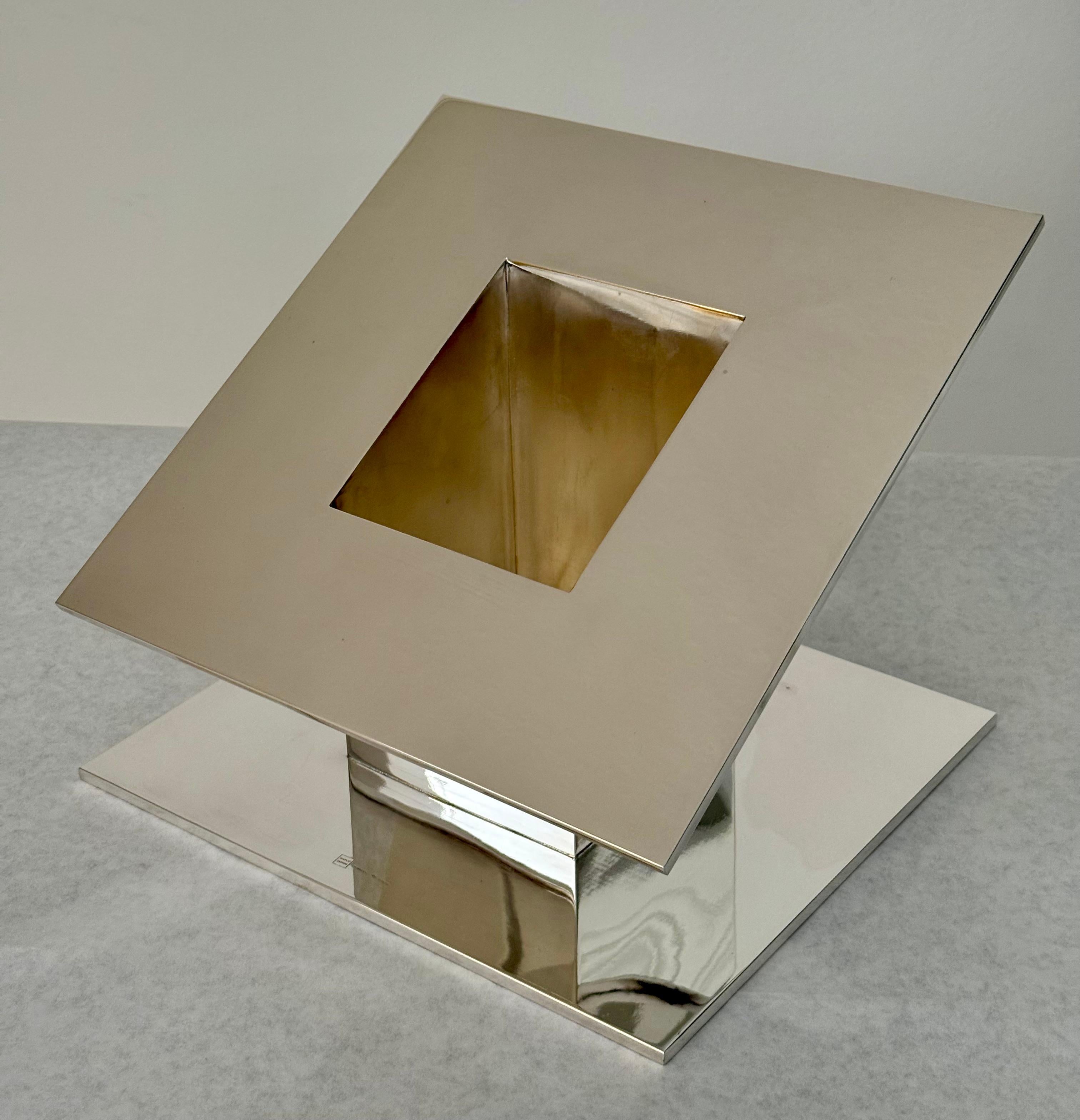 A striking example of postmodern design, this sculptural sterling silver vessel was created by Marco Zanini and expertly fabricated by the esteemed Italian silversmith Pampaloni. Designed in the 1980s during the height of the Memphis Group