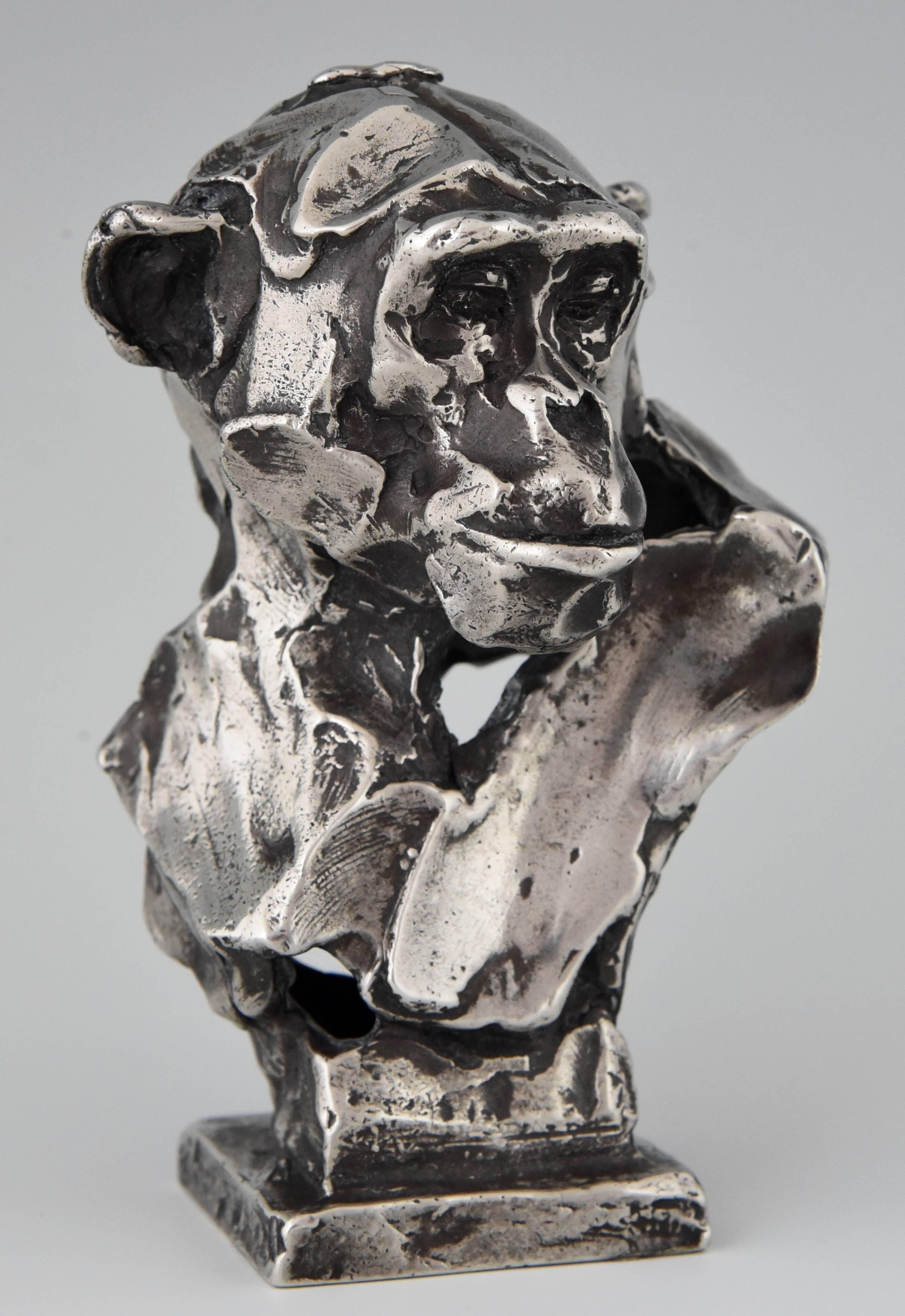 Beautiful sterling silver sculpture of a chimpanzee monkey by Erwin Peeters, Belgium, 2004.
Signed, Numbered EA I/V, foudry seal Art Casting.
Limited edition of five. One immediately available. 
Polished and patinated sterling silver.
 