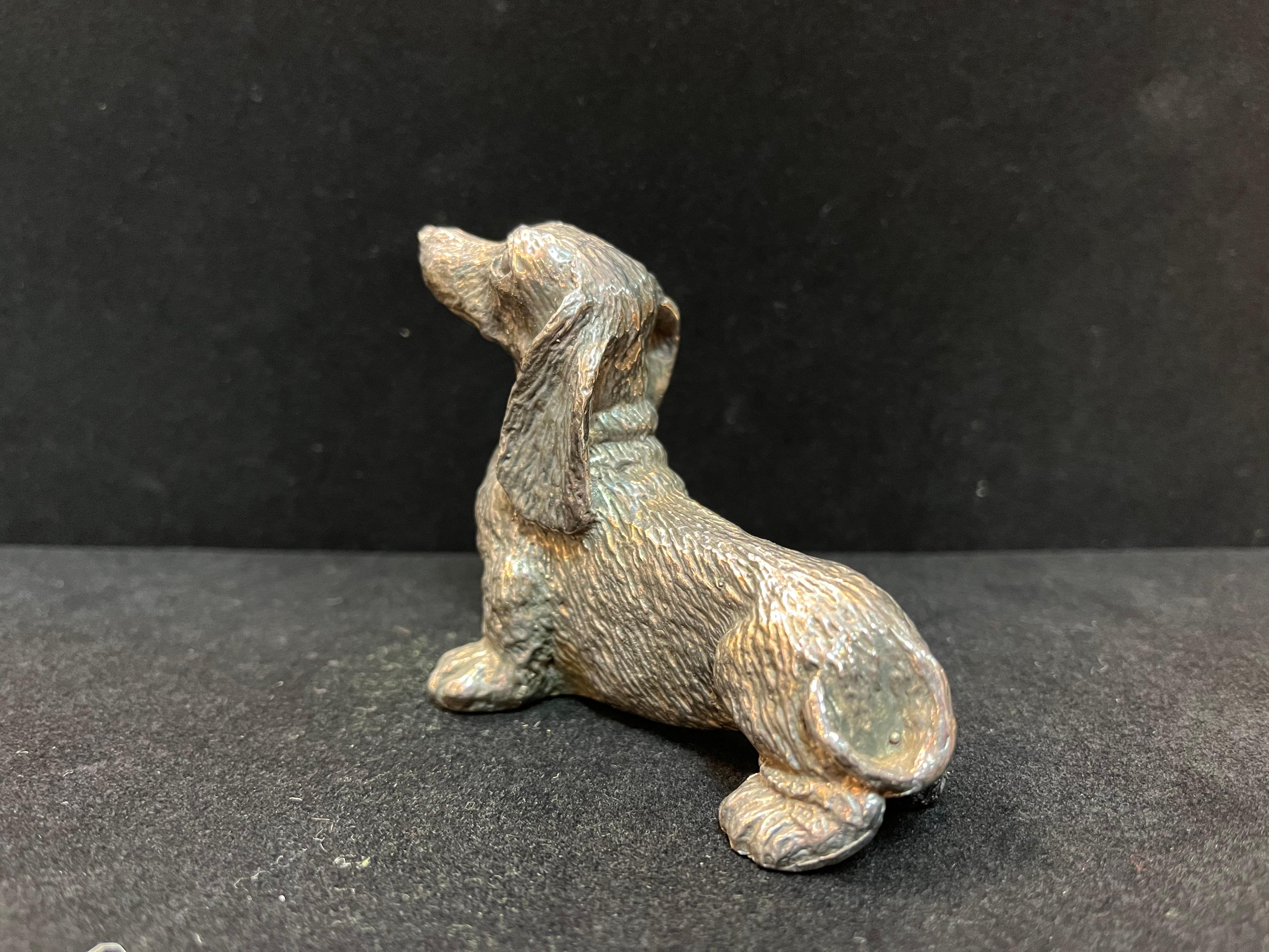 Sterling Silver Sculpture of a Long Haired Dachshund Dog with a Cute Expression In Good Condition In Atlanta, GA