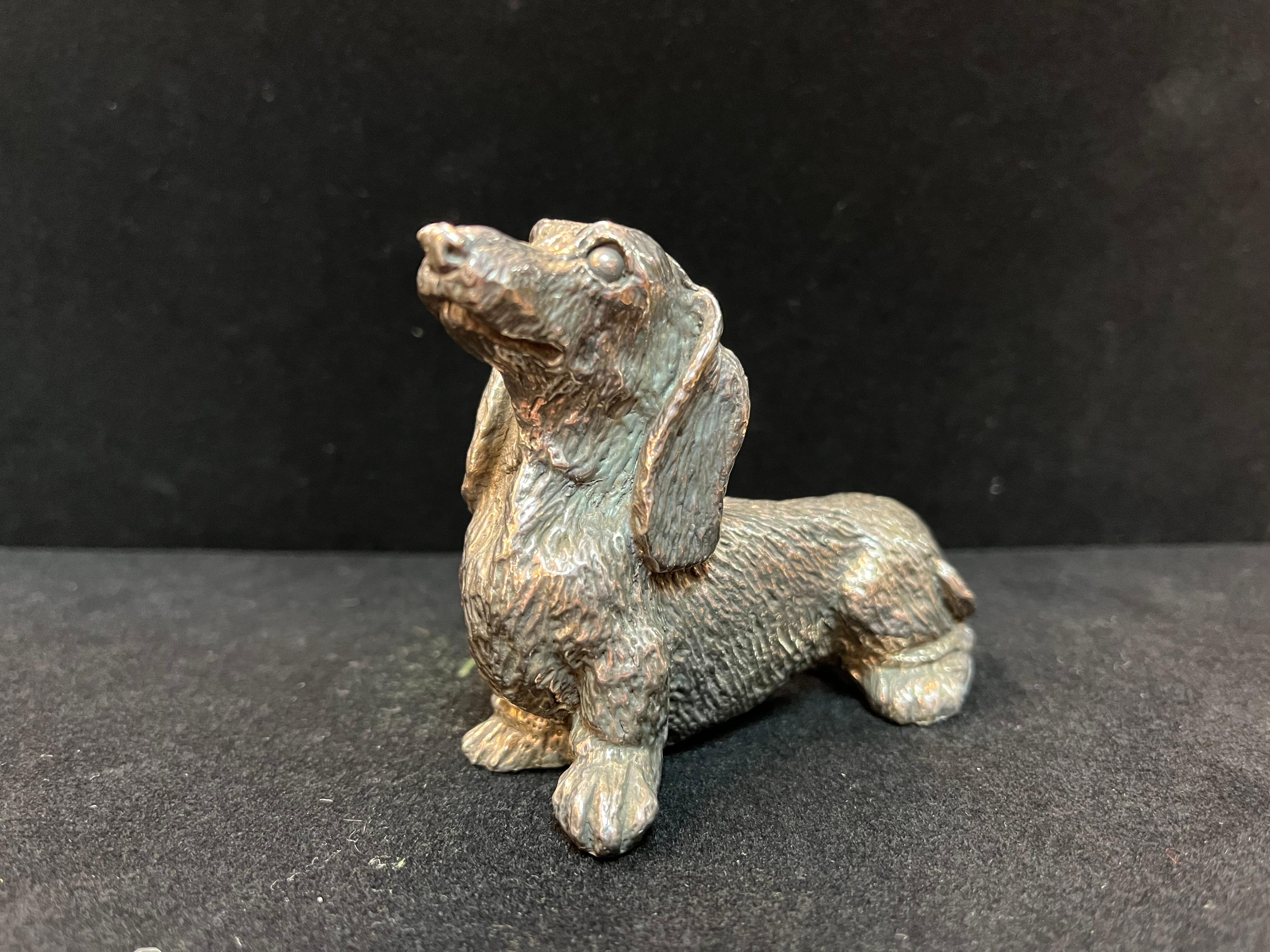 Sterling Silver Sculpture of a Long Haired Dachshund Dog with a Cute Expression 1