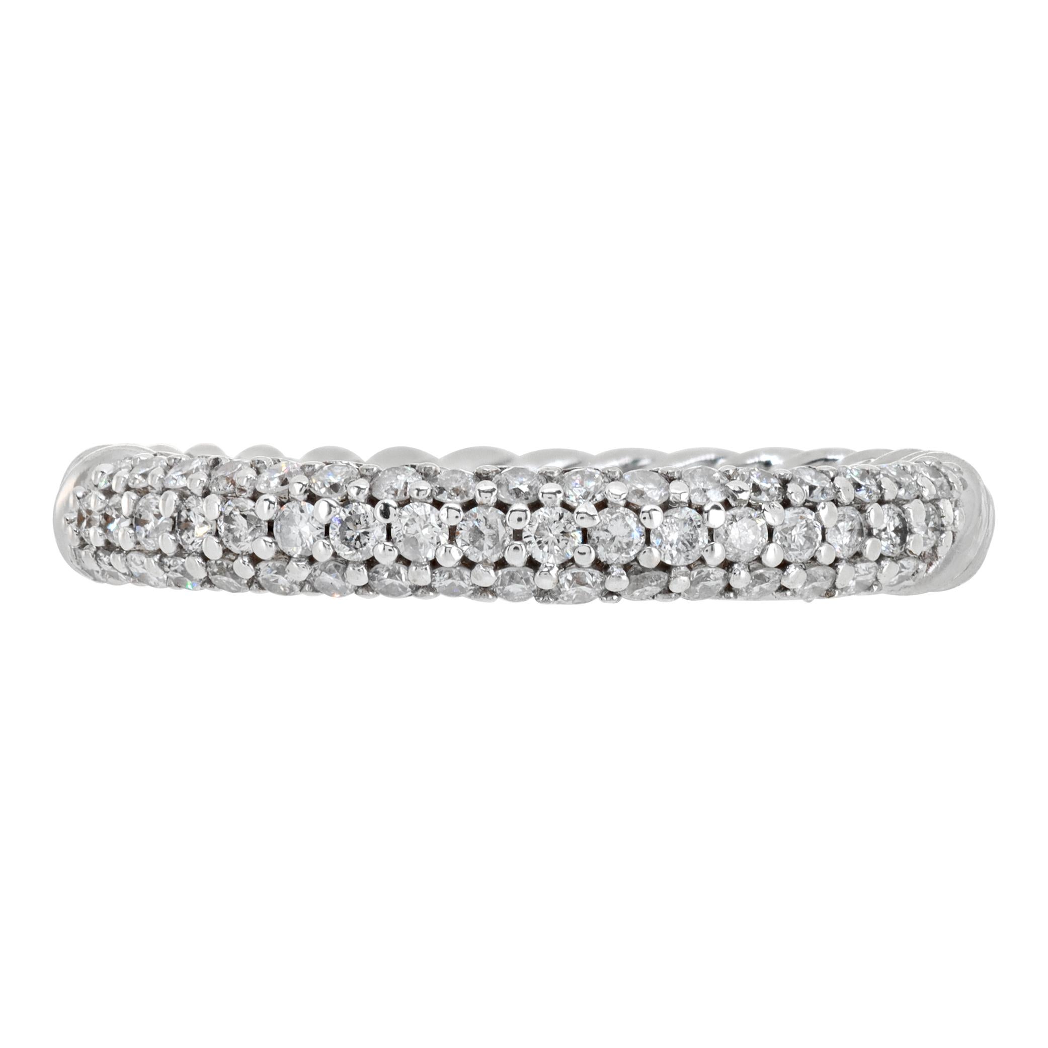 Semi eternity cable ring with diamonds in sterling silver with .35 carat in round pave diamonds. Size 7, width 3mm.

This Unsigned ring is currently size 0 and some items can be sized up or down, please ask! It weighs 2.2 pennyweights and is