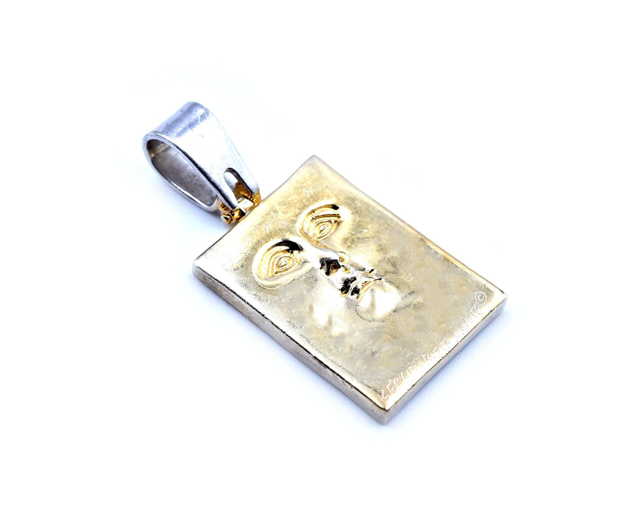 Designer: Sergio Bustamante
Material: sterling silver
Dimensions: pendant measures 18mm by 24mm	
Weight: 7.37 grams
