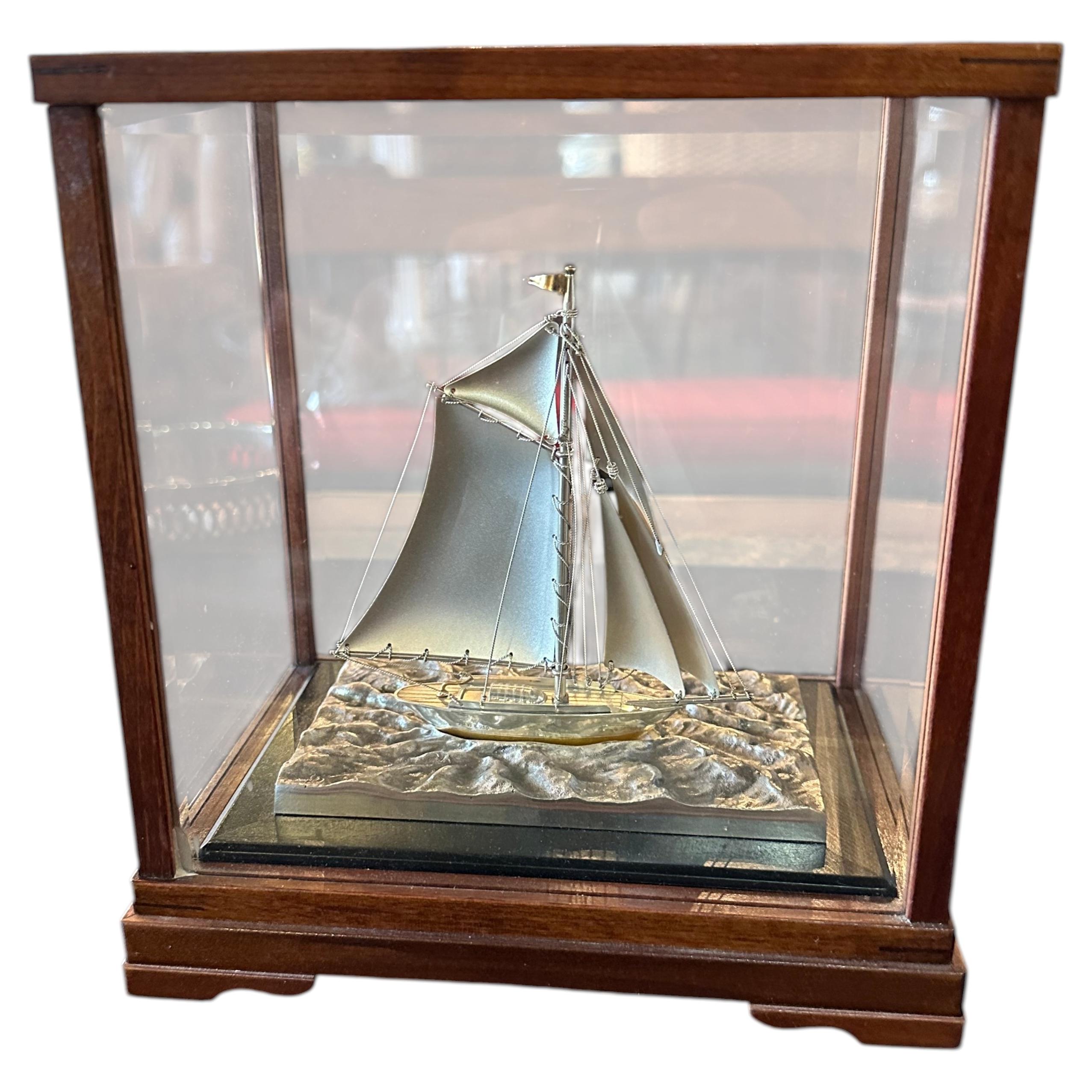 Sterling silver ship in a beautiful wood and glass display case For Sale
