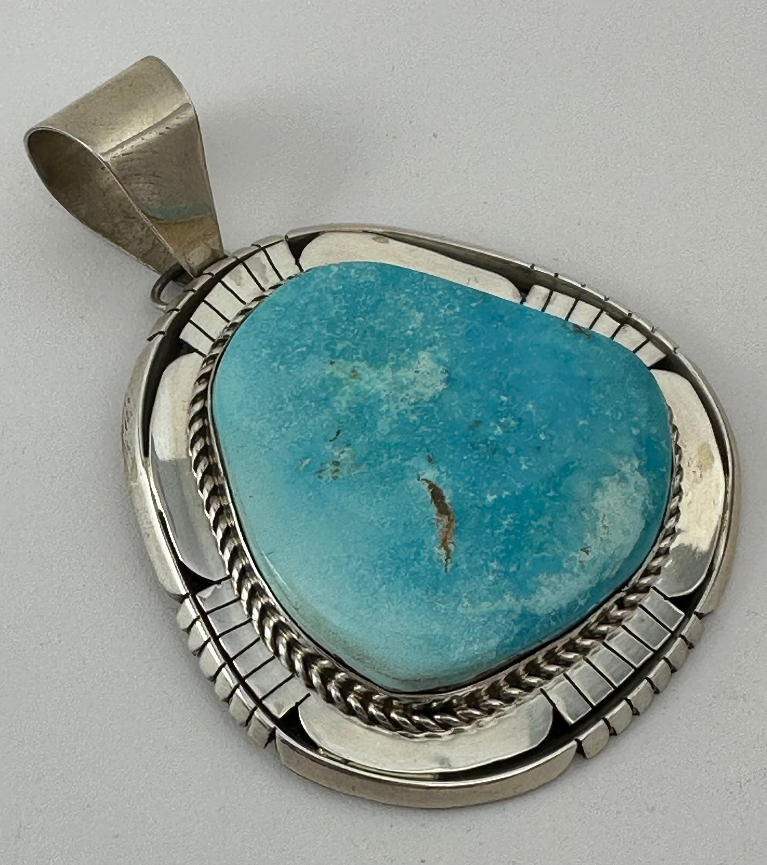 Sterling Silver .925 Sleeping Beauty Turquoise Pendant  by Navajo Artist Betta Lee
Measures approximately 2