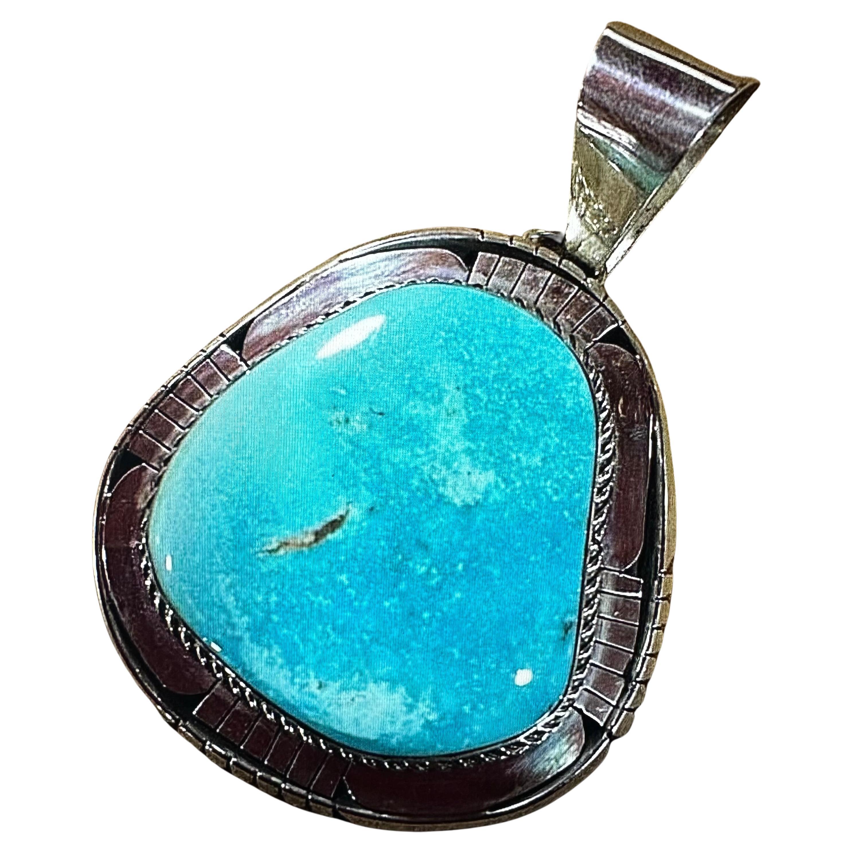 Sterling Silver Sleeping Beauty Turquoise Pendant by Navajo Artist Betta Lee For Sale