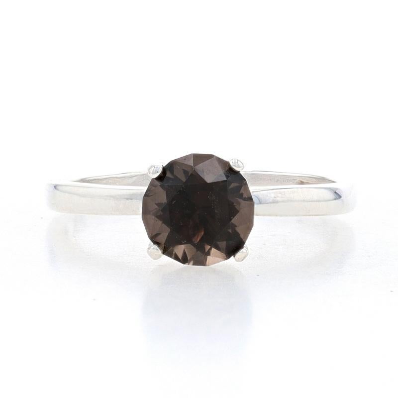 Size: 5 3/4
Sizing Fee: Down 2 sizes or up 2 sizes for $30

Metal Content: 925 Sterling Silver

Stone Information

Natural  Smoky Quartz 
Carat(s): 1.10ct
Cut: Round 
Color: Brown

Total Carats: 1.10ct

Style: Solitaire

Measurements

Face Height