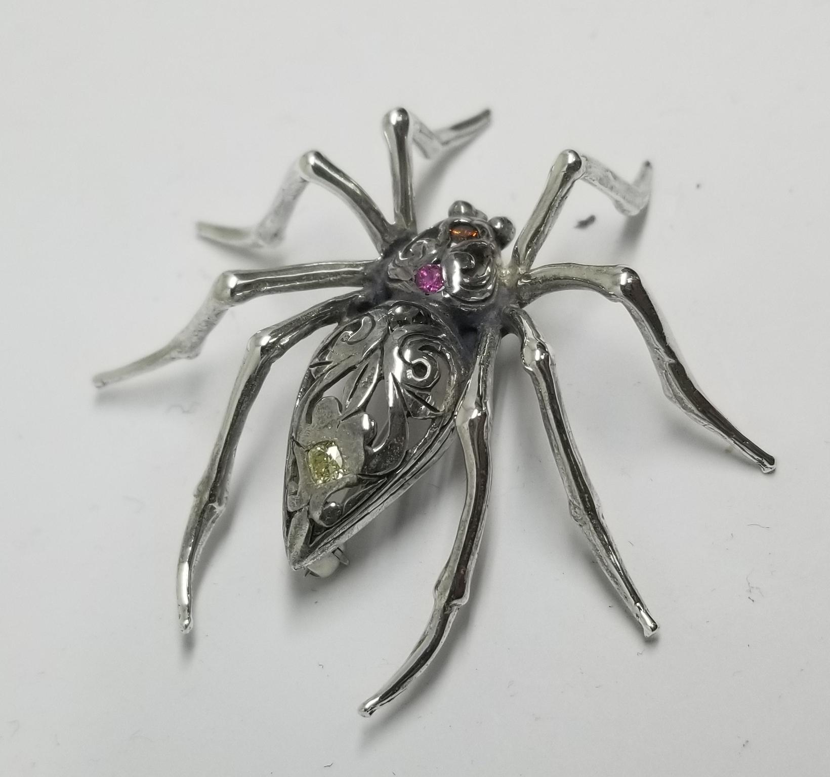 metallic silver spider