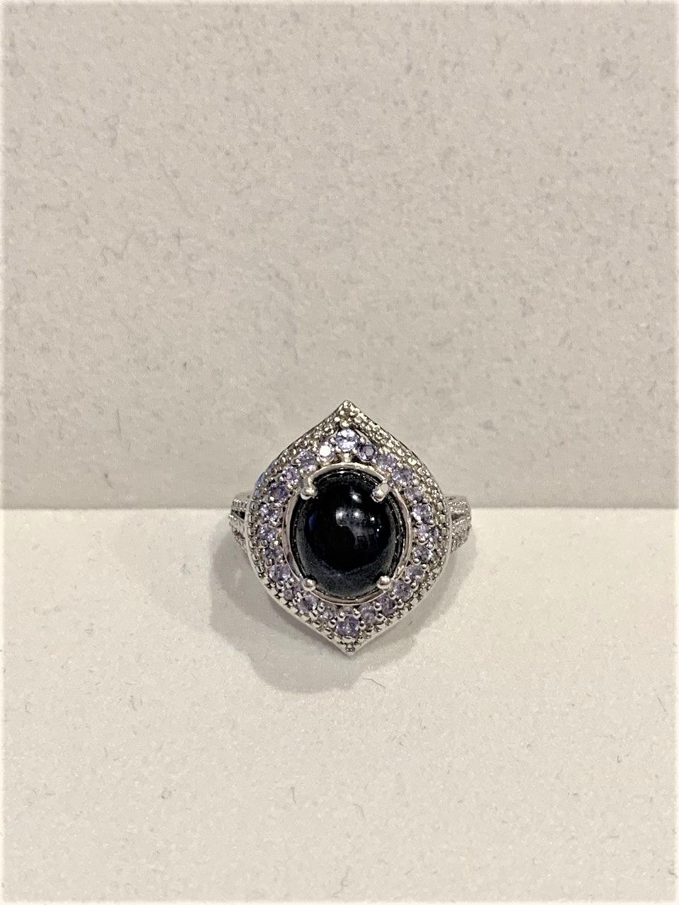 Oval Cut Sterling Silver Star Sapphire Ring with Light Blue Stone Accents