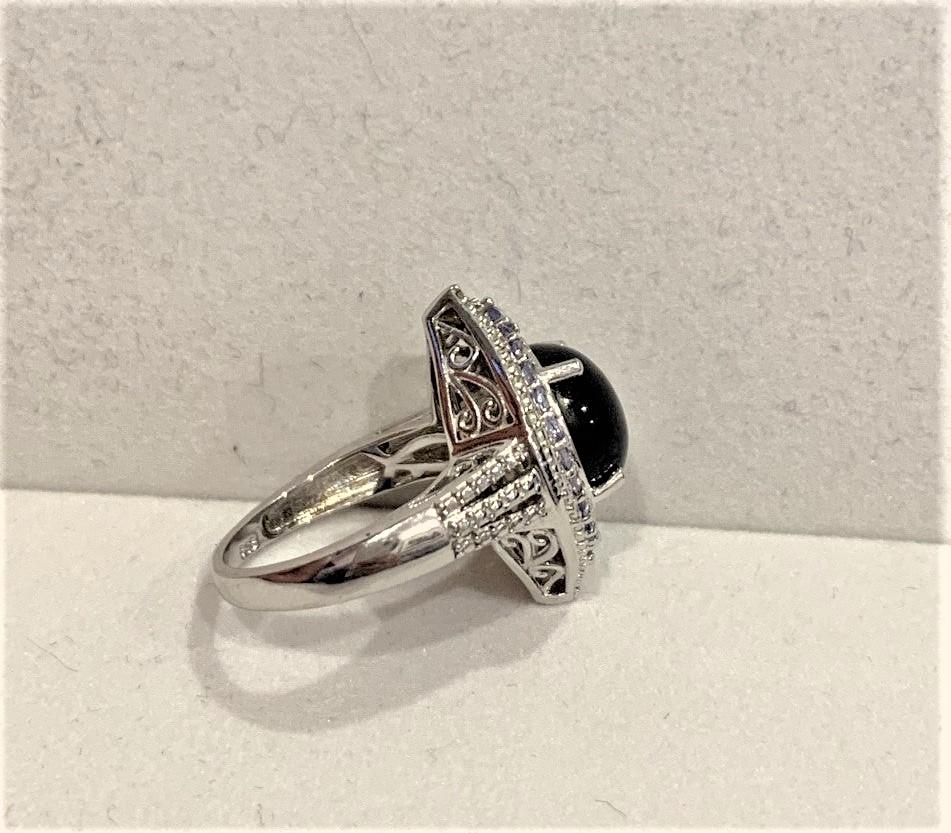 Women's Sterling Silver Star Sapphire Ring with Light Blue Stone Accents