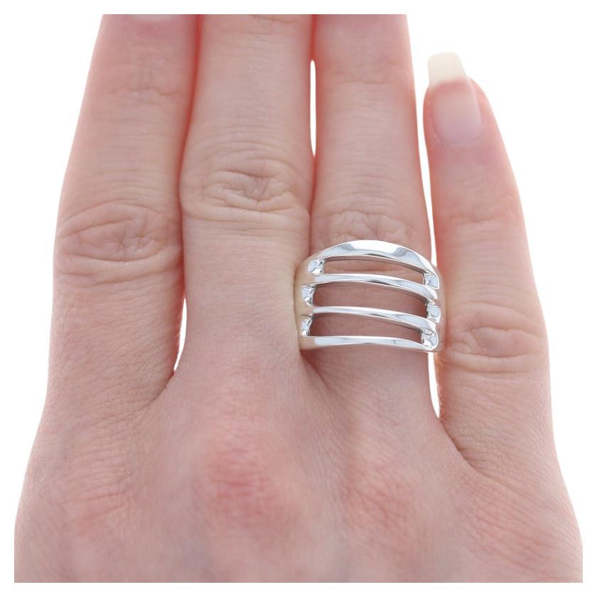 Size: 8 1/2
Sizing Fee: Up 2 sizes for $35 or Down 2 sizes for $35

Metal Content: Sterling Silver

Style: Statement Band
Theme: Stripes
Features: Open Cut Design

Measurements
Face Height (north to south): 19/32
