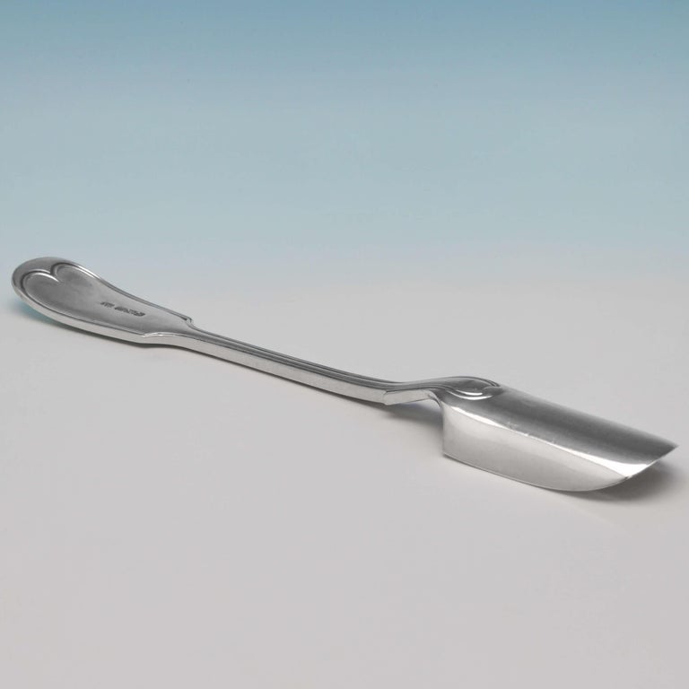 Hallmarked in Sheffield in 1904 by Henry Atkin, this handsome, Edwardian, antique, sterling silver stilton scoop, is in “fiddle and thread” pattern. The stilton scoop measures 8.5