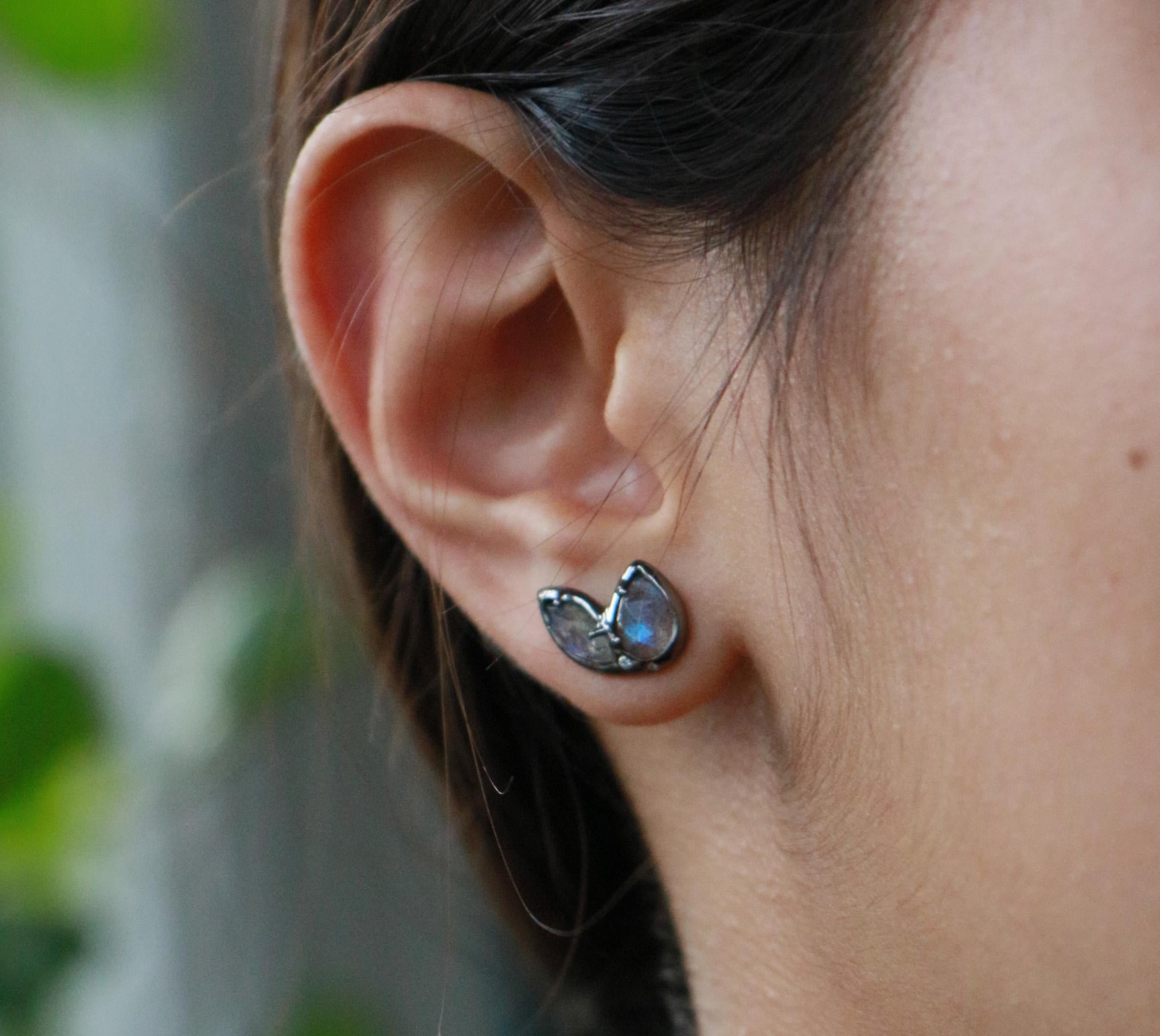 The Splay stud earring is both elegant and edgy. The creativity is yours as it can be worn in a multitude of ways. This Splay earring has marquise and pear shaped rose cut labradorite and diamond accents set in sterling silver.

Sterling silver with