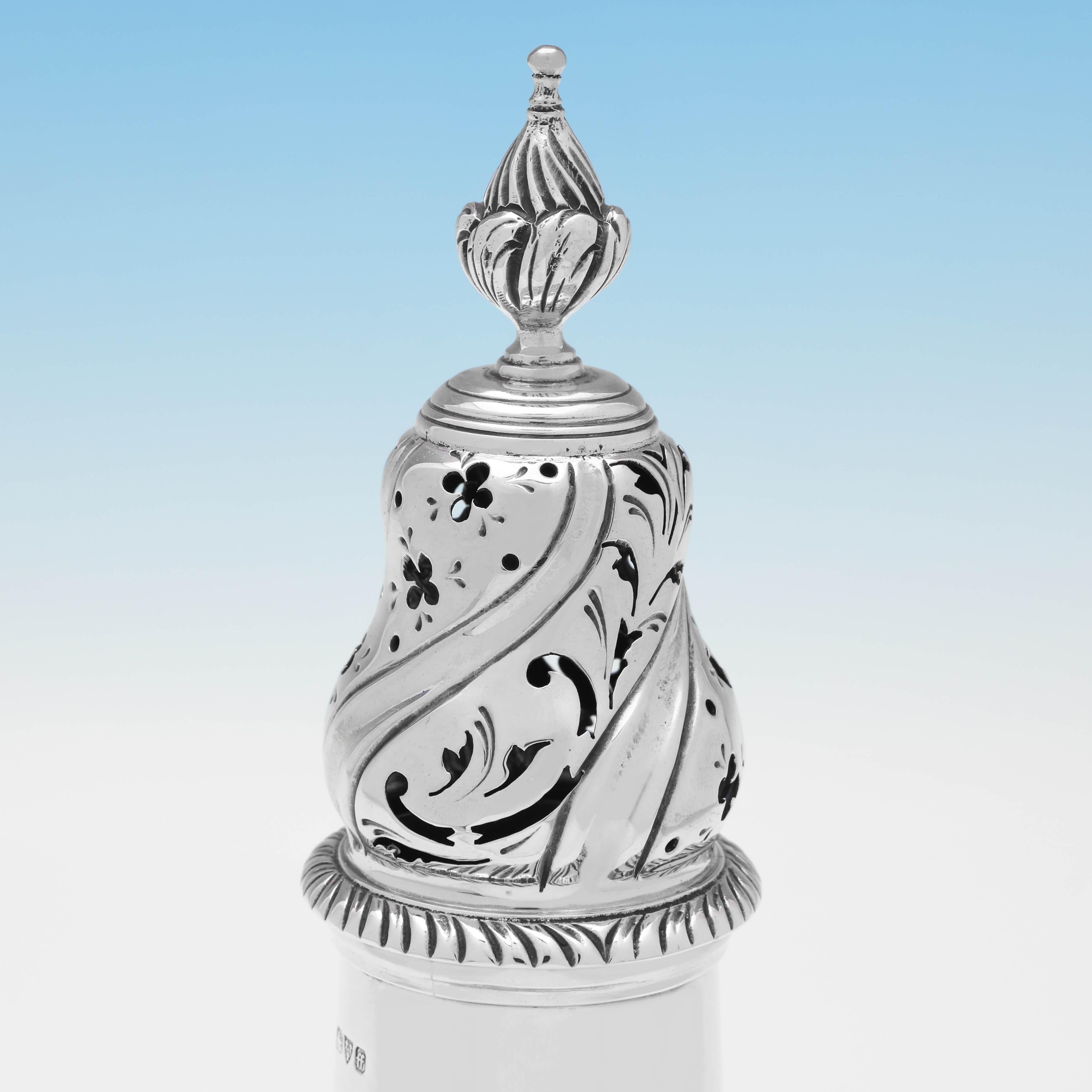Hallmarked in Chester in 1931 by Jay, Richard Attenborough & Co. Ltd., this charming, Sterling Silver Sugar Caster, is of traditional form, and features gadroon borders and a pull of lid. 

The sugar caster measures 9