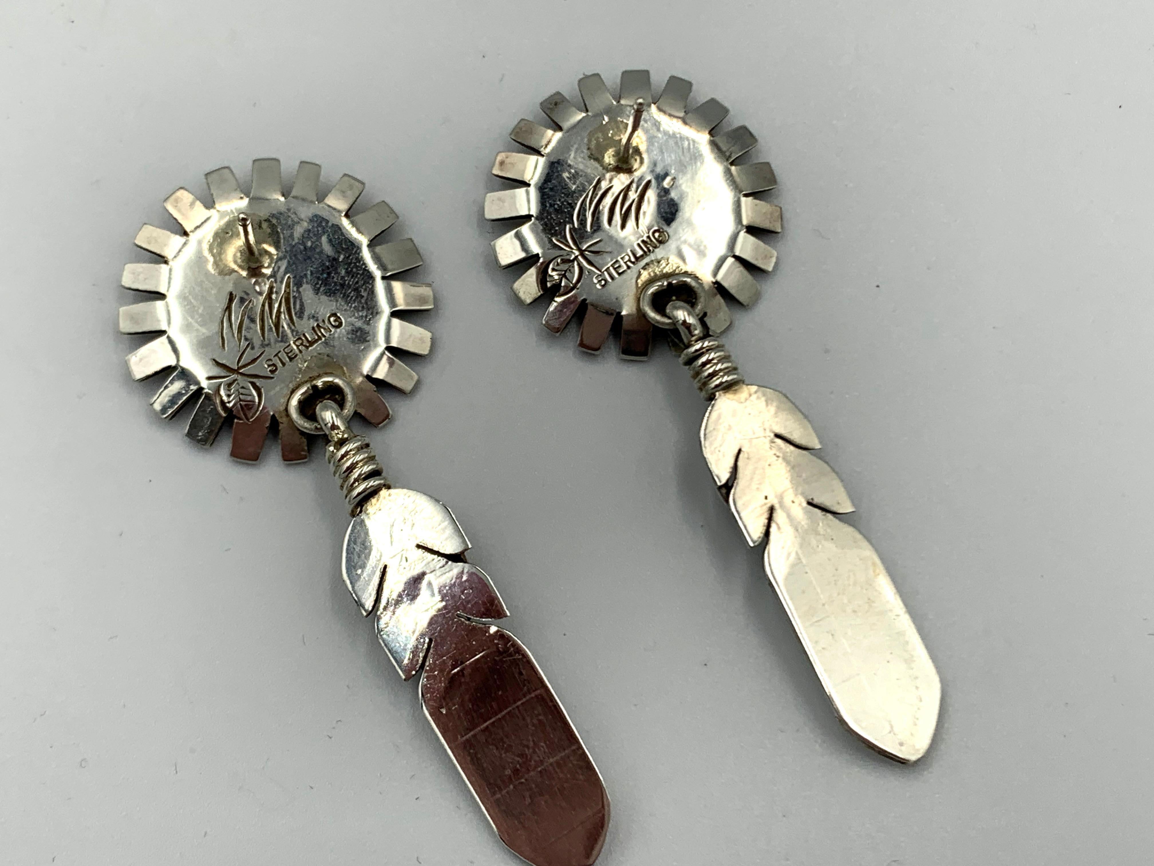 Native American Sterling Silver Sunface and Feather Earrings by Navajo Silversmith Nelson Morgan For Sale