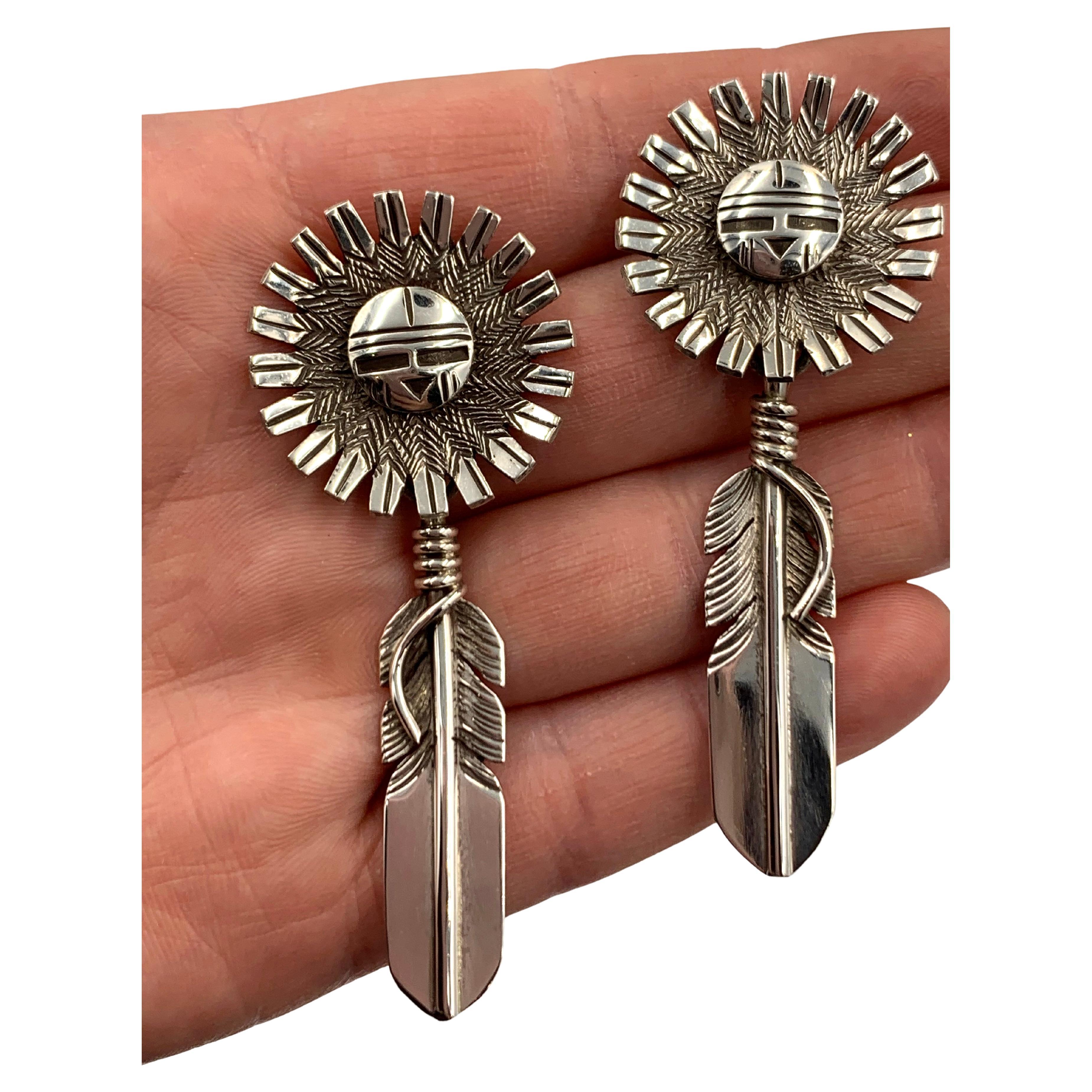 Sterling Silver Sunface and Feather Earrings by Navajo Silversmith Nelson Morgan For Sale
