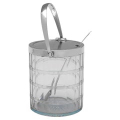 Antique Sterling silver swing handled jam pot with spoon made by Hukin & Heath in 1925