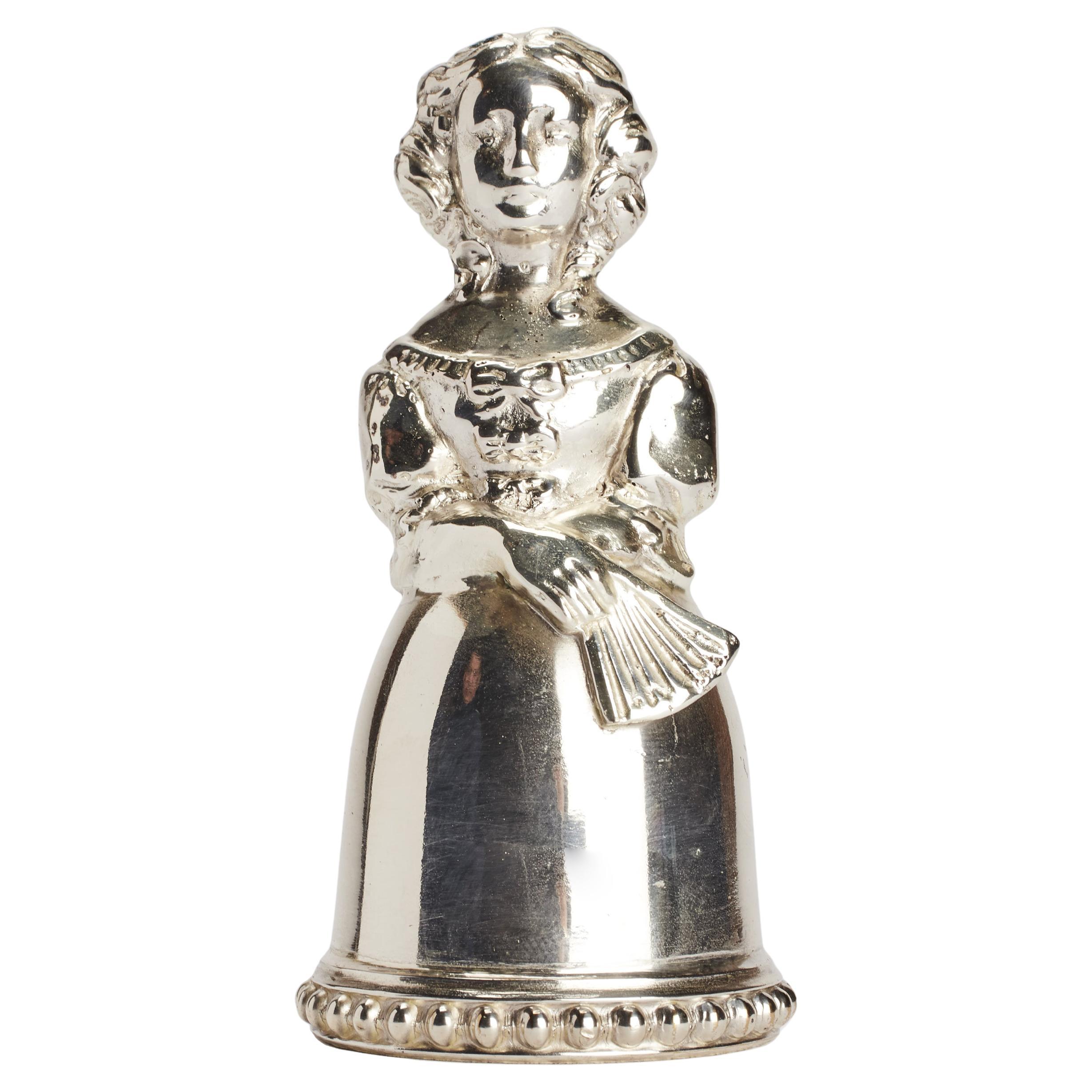 Sterling silver table bell, a woman with a fan, USA end of 19th century.