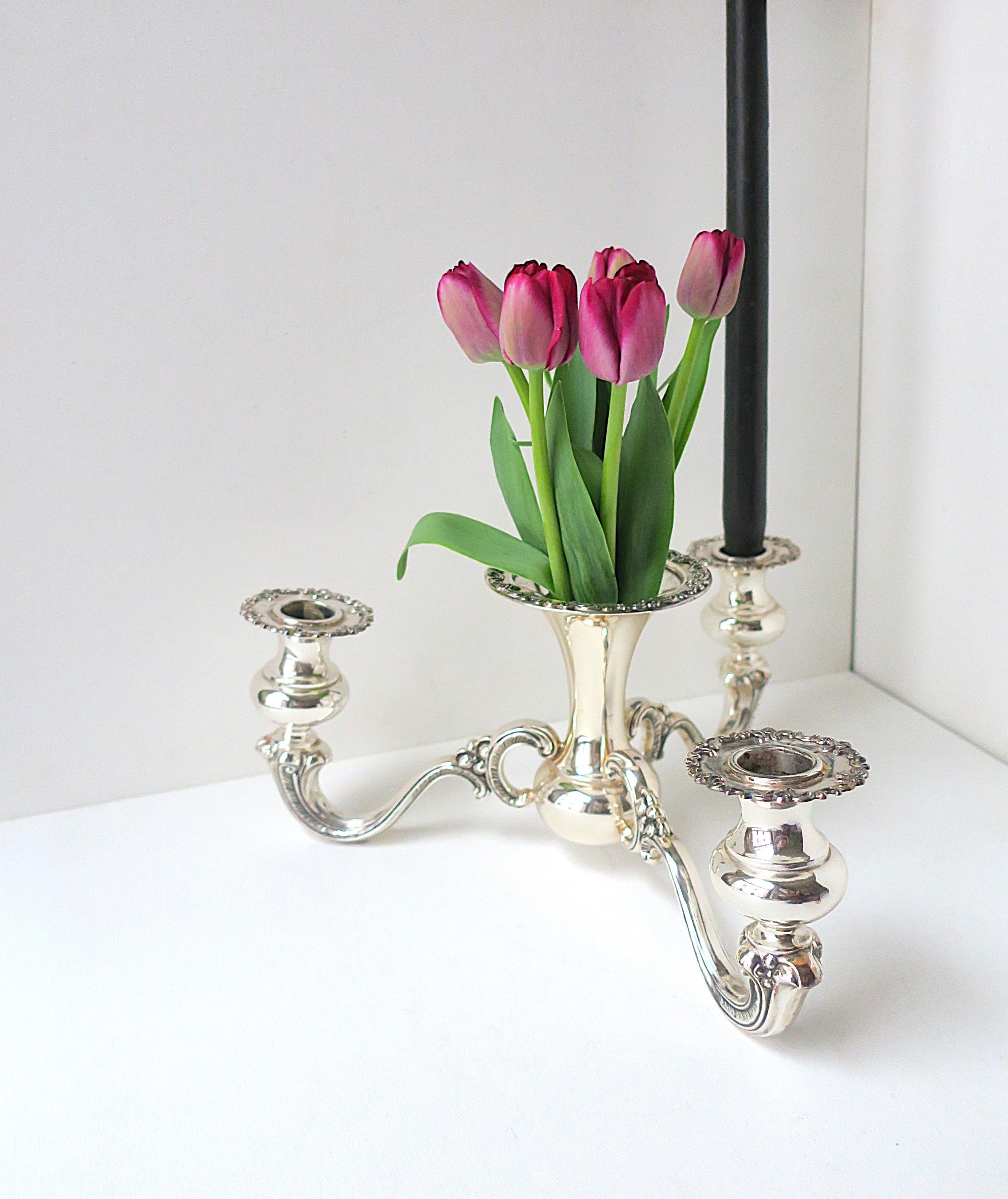A beautiful European sterling silver table candelabra centerpiece with center vase, circa 20th century, Europe. A beautiful piece for a table setting, tablescape, including traditional, modern, farm, etc. Beautiful sterling silver adds a touch of