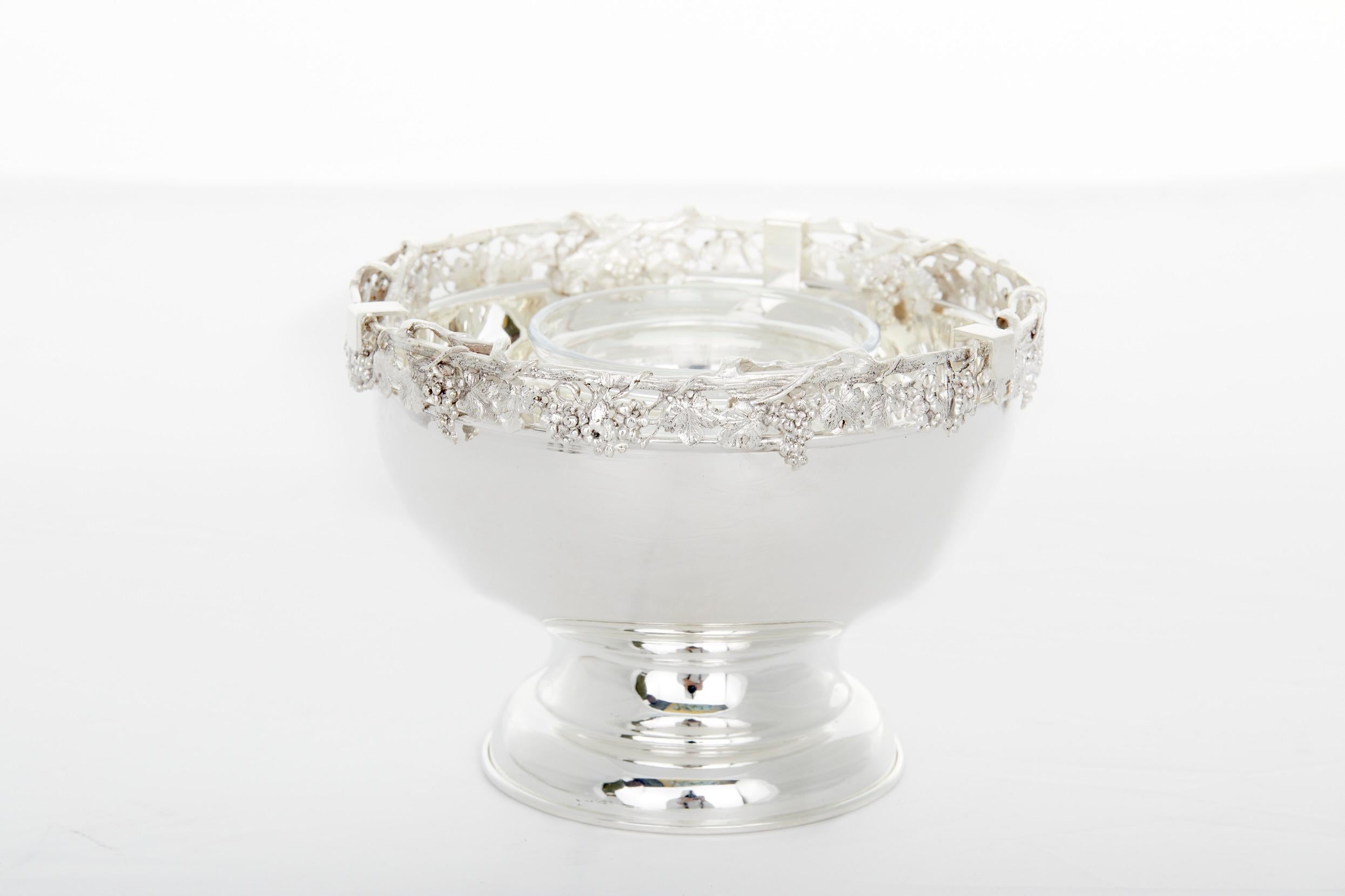 Beautiful hand made sterling silver three piece barware / tableware caviar service. The caviar piece features a round footed base with exterior grape vine top design and glass caviar bowl. The piece is in great condition. Minor wear. Maker's mark