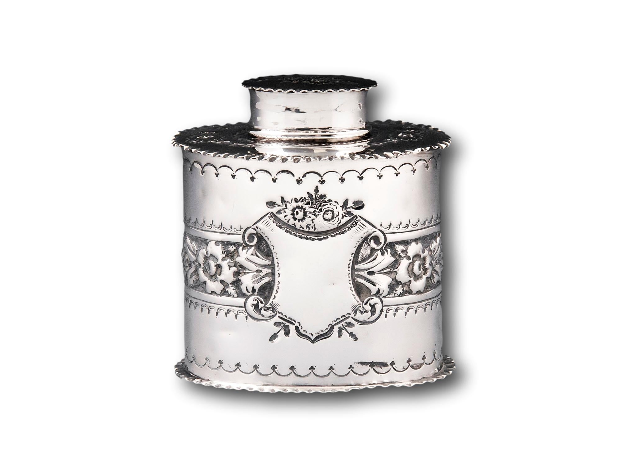 Decorate with Repousee Flowers 

From our Tea Caddy collection, we are pleased to offer this Sterling Silver Tea Caddy. The Tea Caddy of oval canister form with a central band of floral repousse decoration with two central shields on the front and
