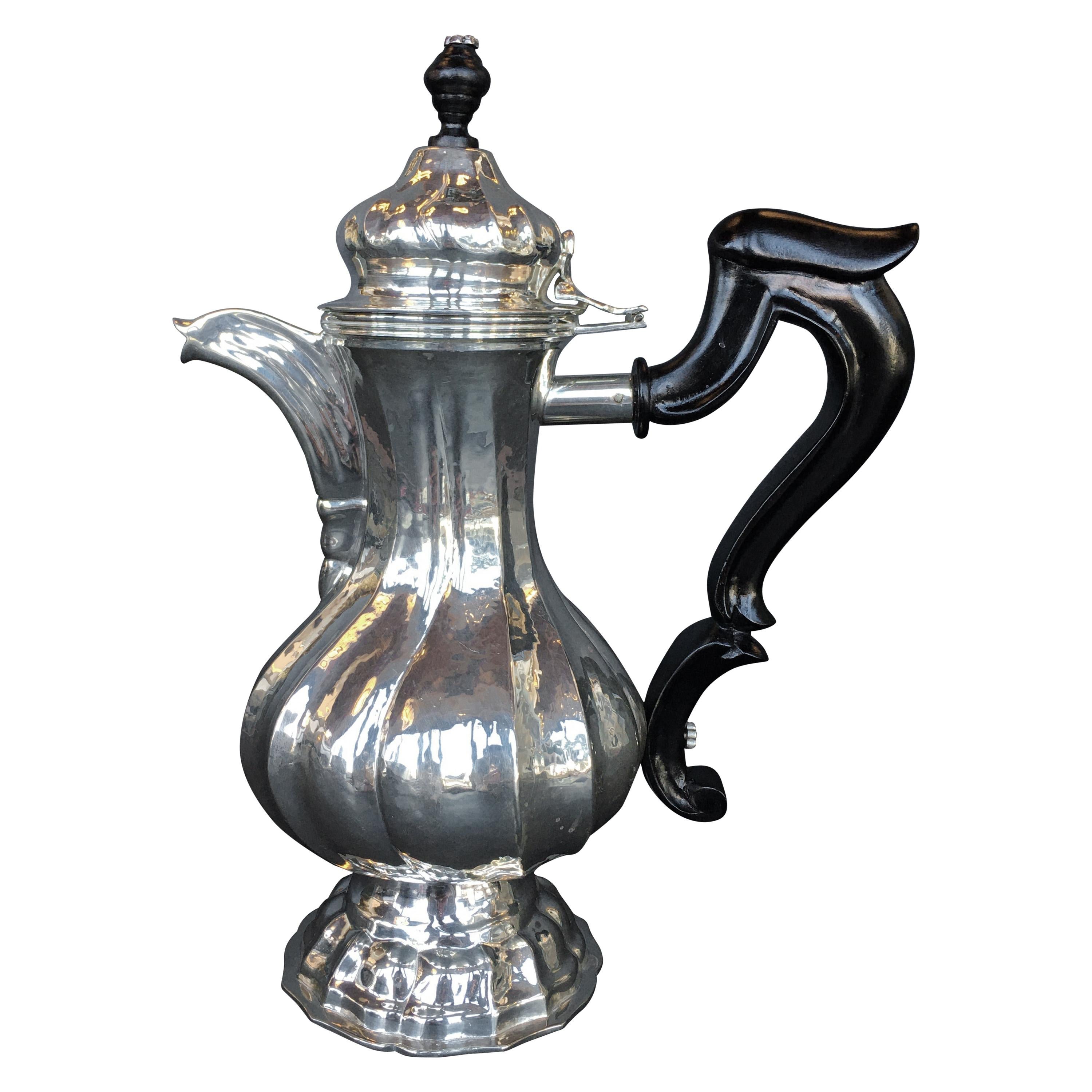 Tetera de plata de ley
