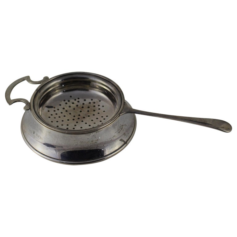 Sterling Silver Tea Strainer and Stand Birmingham, 1945 at 1stdibs