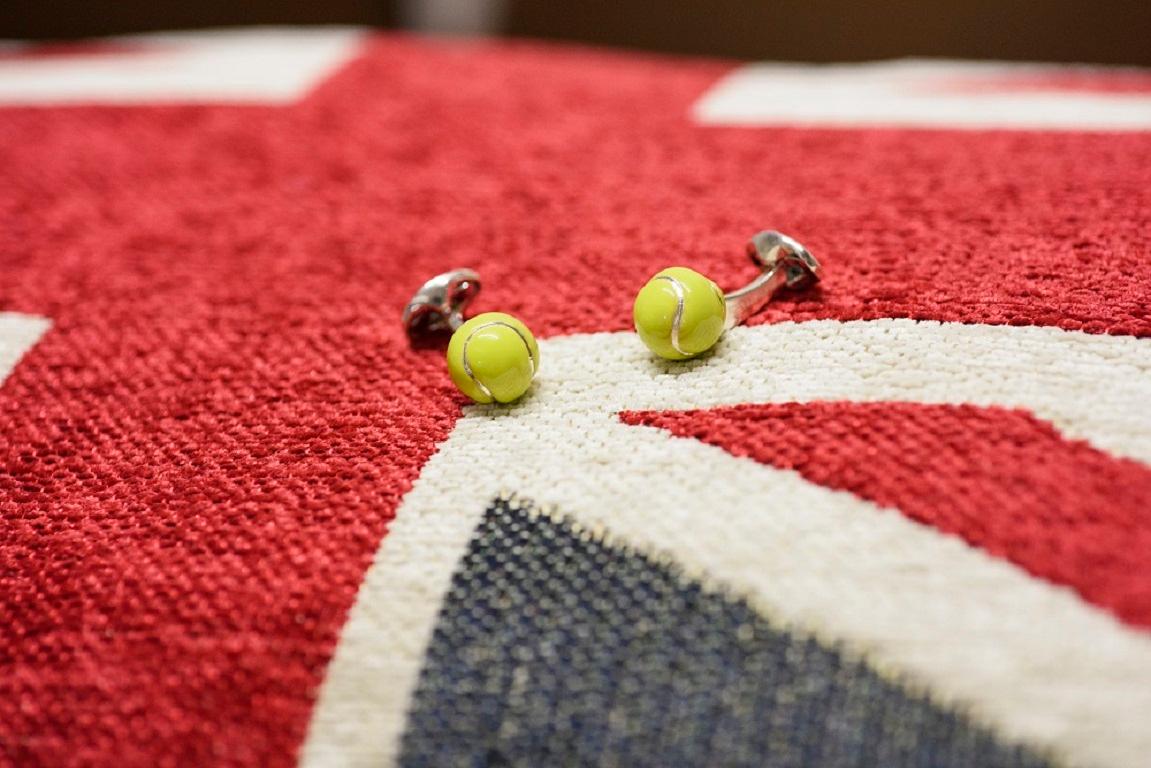 DEAKIN & FRANCIS, Piccadilly Arcade, London

Game, Set and Match! These sterling silver tennis ball cufflinks are attractively hand-enamelled in bright yellow, these cufflinks are a must for any sporting collection and are sure to brighten up any