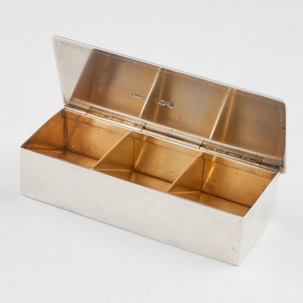 A sterling silver three compartment stamp box, hallmarked in London 1895 For Stokes & Ireland Ltd.

Condition : Very good, a very small compression on the front panel that may be seen when rotated in bright light
Restoration : None
Weight :