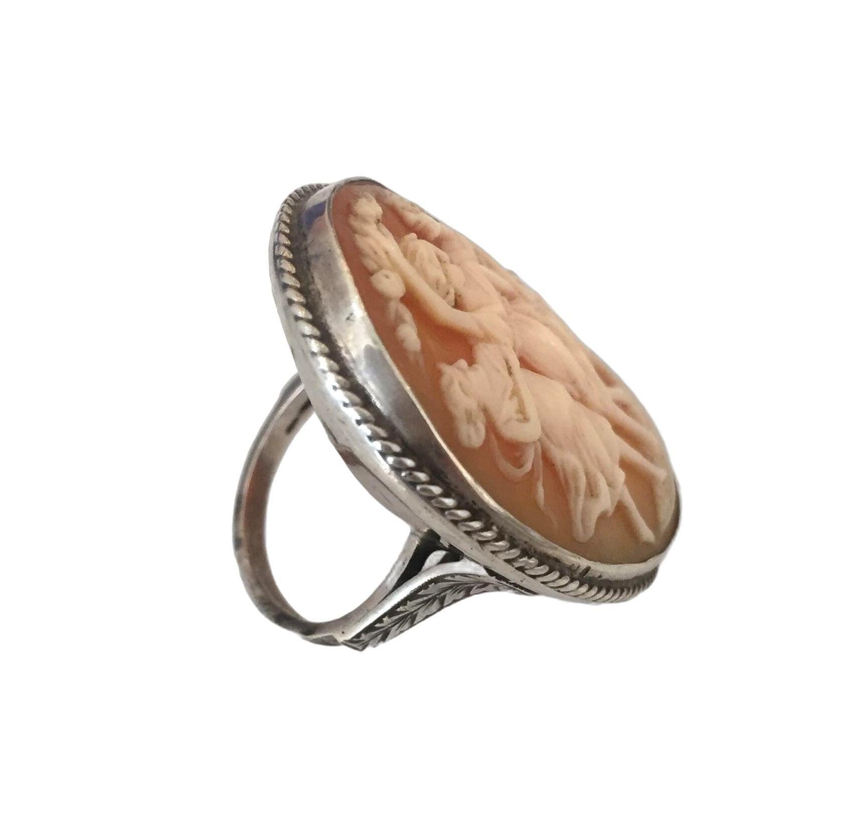 Grecian Revival Art Deco Sterling silver ring with hand-carved butterscotch coral colored shell cameo featuring the 