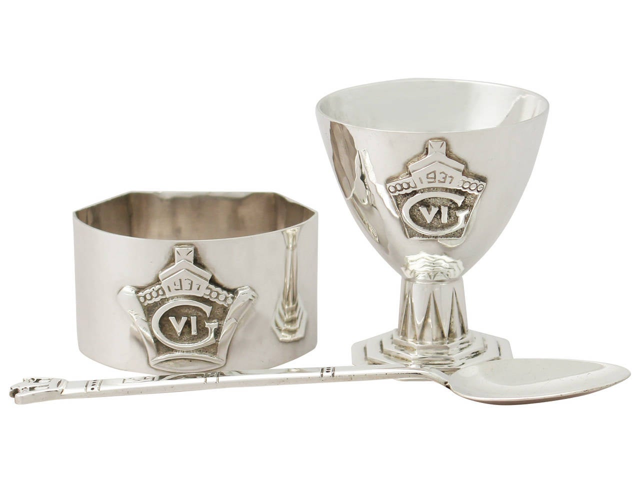 An exceptional, fine and impressive antique George VI English sterling silver christening set in the Art Deco style, boxed; an addition to our collection of silver christening gifts.

This exceptional antique George VI sterling silver christening