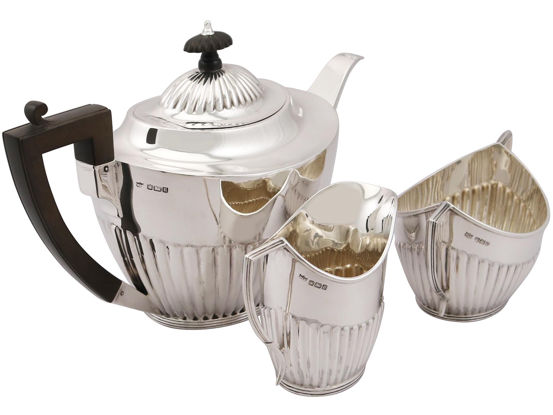 An exceptional, fine and impressive antique George V English sterling silver three tea set; an addition to our silver teaware collection.

This exceptional antique silver tea set, in sterling standard, has been modelled in the Queen Anne