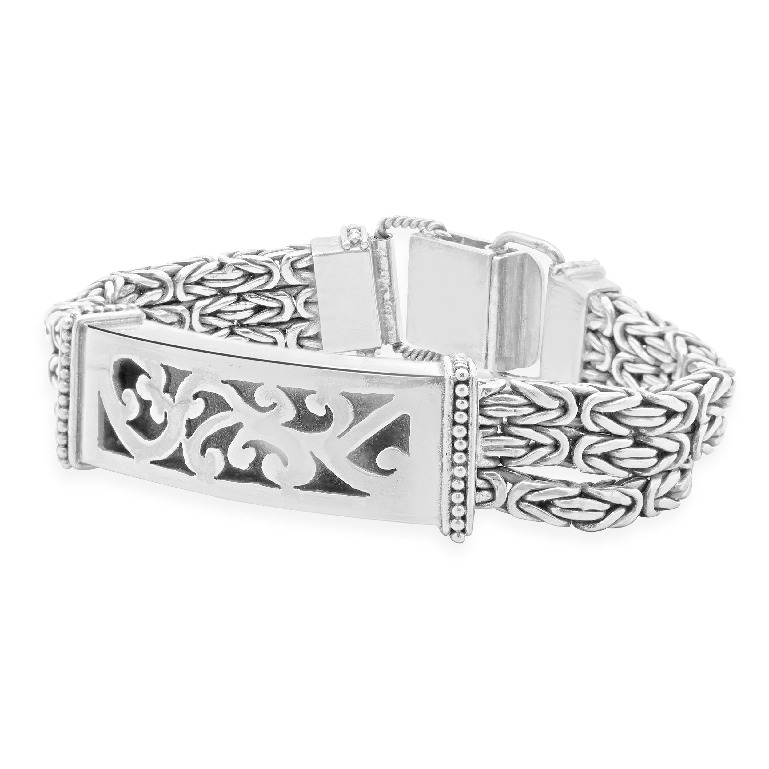 Designer: custom
Material: sterling silver
Dimensions: bracelet will fit up to a 6.75-inch wrist
Weight: 56.77 grams
