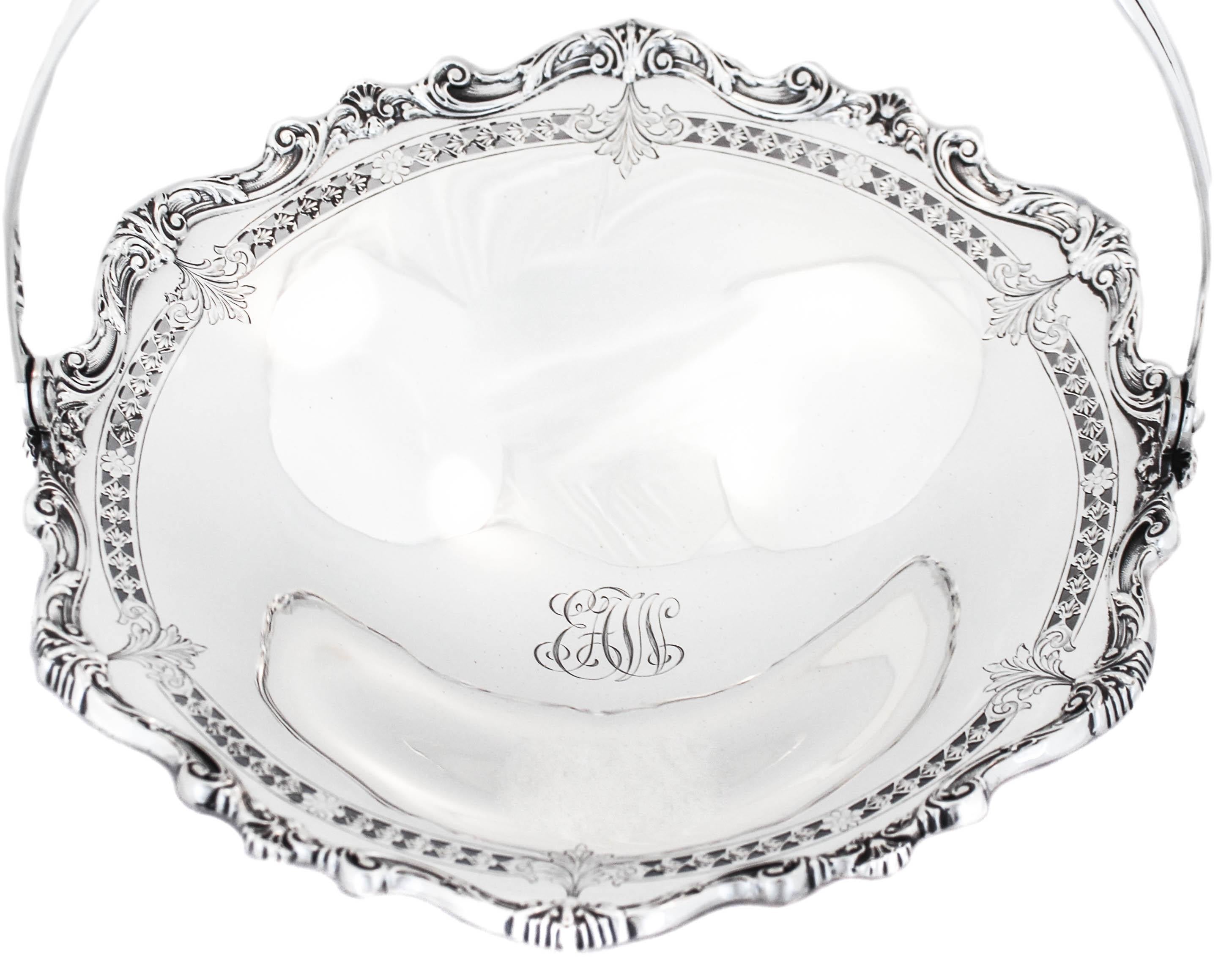 We are delighted to offer you this sterling silver basket by the world renowned Tiffany & Company. An interesting mix of modern and traditional; the handle is sleek and modern while the basket is ornate and traditional. The best of both worlds!!
It