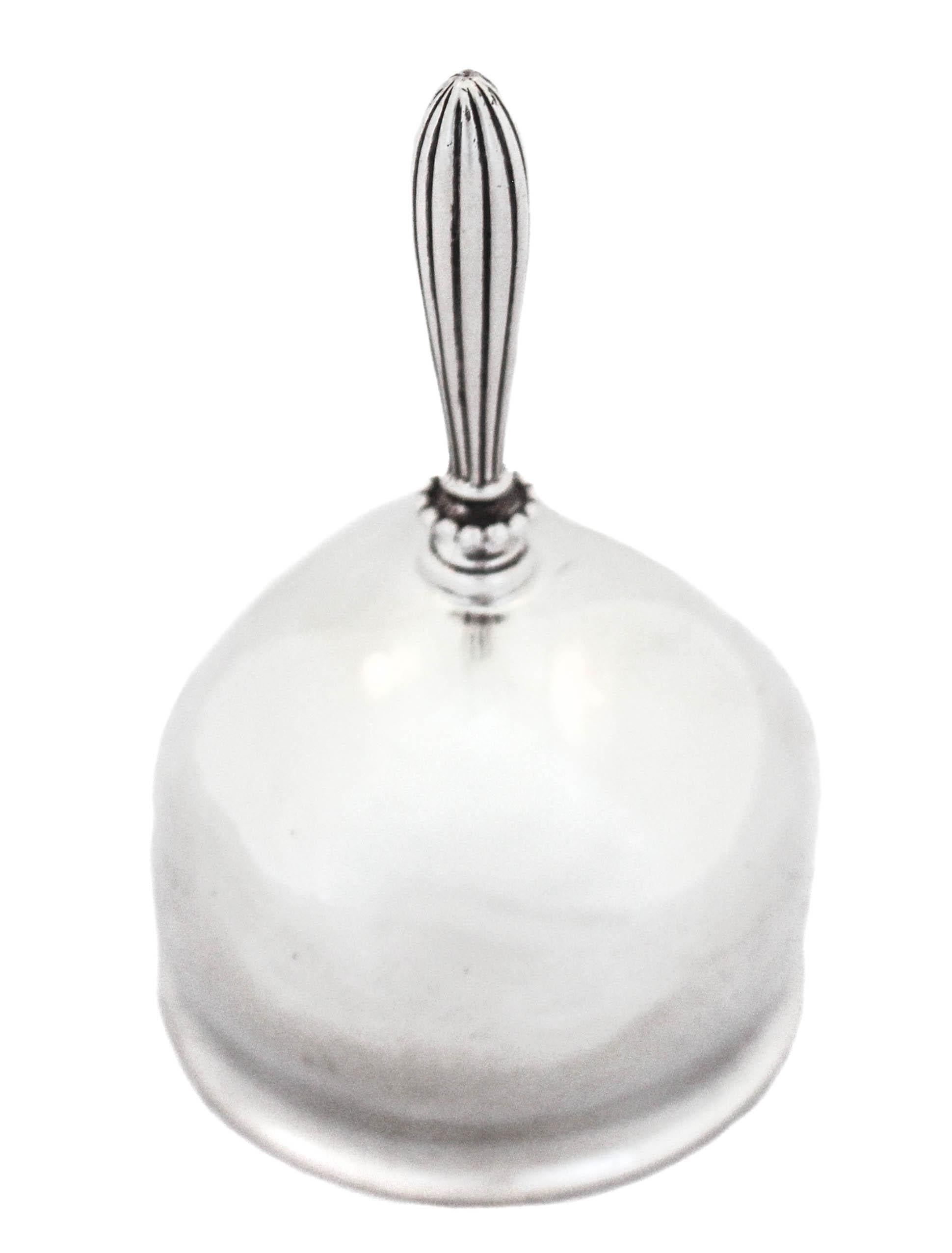 Rare sterling silver bell by Tiffany and Company. A great way to get peoples attention or to silence a rowdy crowd, this bell is loud and clear!! Simple design on the handle and no monogram.