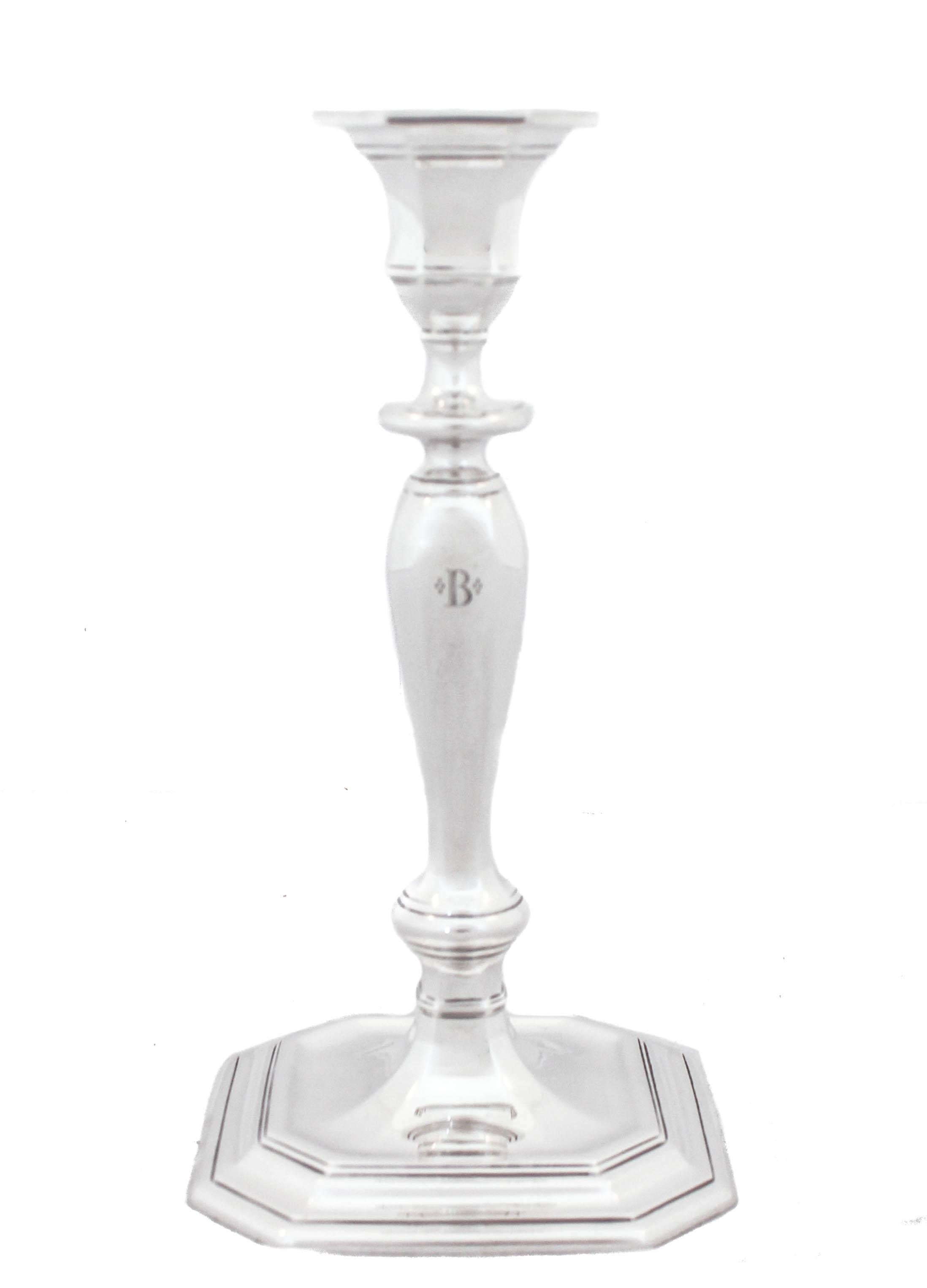 Being offered is a pair of sterling silver candlesticks by the world renowned Tiffany and Company.  Designed and manufactured during the post WWII period, the reflect the austere and understated style of that era.  The ornate and fussy style that