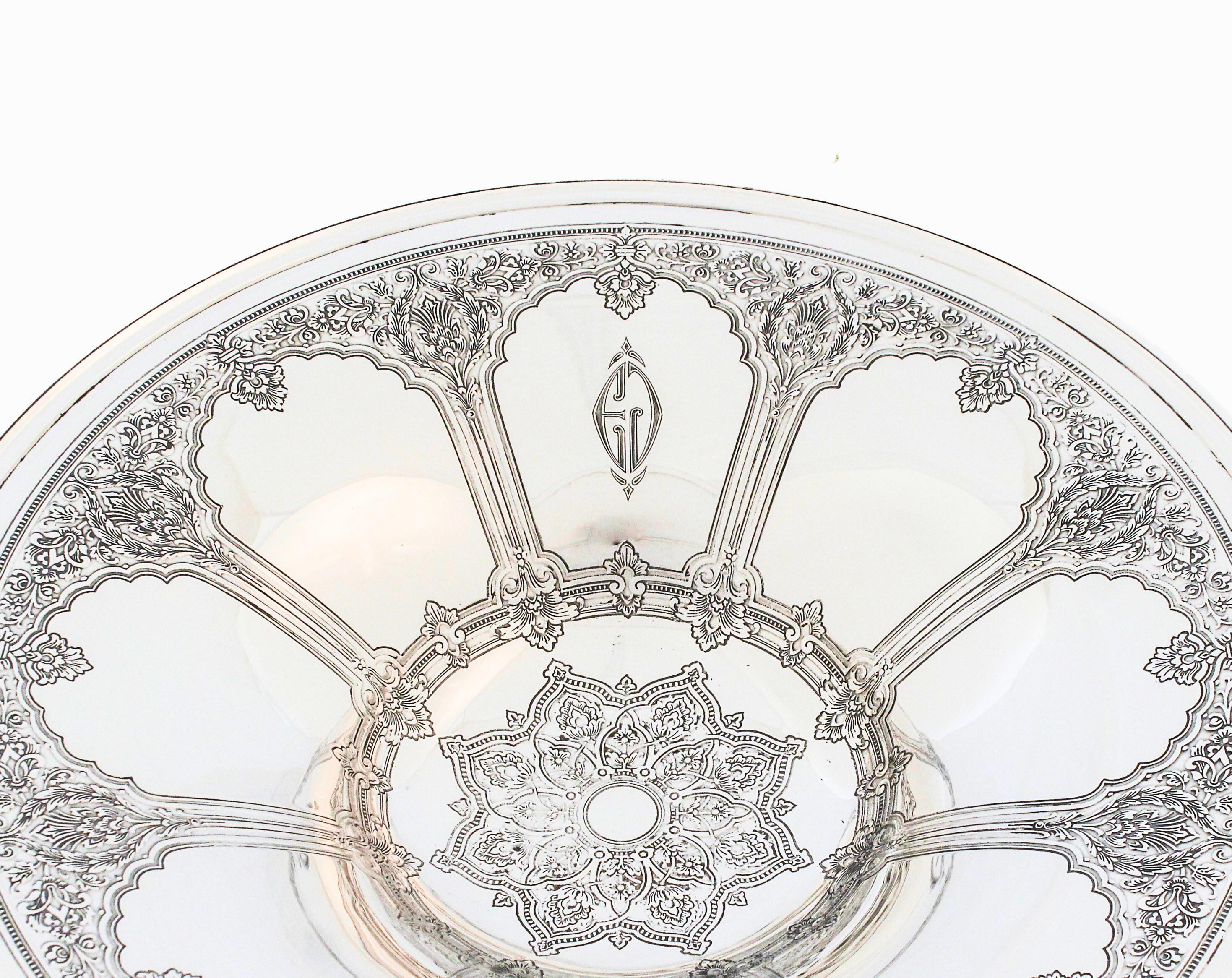 
The bowl features a shallow, wide, octagonal-form body with gently scalloped or lobed edges that evoke an architectural or Gothic Revival motif. The interior is smoothly curved for practical use, with a subtle depth of about 1.5–2 inches, ideal for