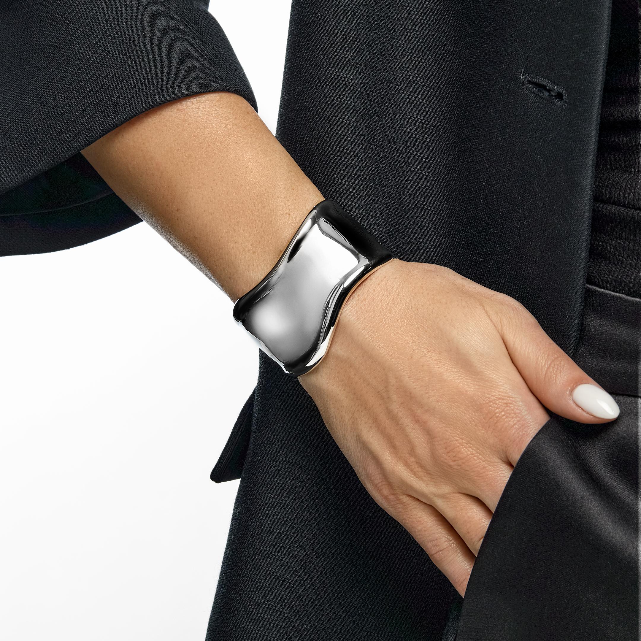 The Tiffany & Co. Bone Cuff is an ode to the human form. The ergonomic design of the bone cuff is destined to become one with the body, rather than worn upon the body. The Tiffany bone cuff is crafted in sterling silver and specific to the anatomy