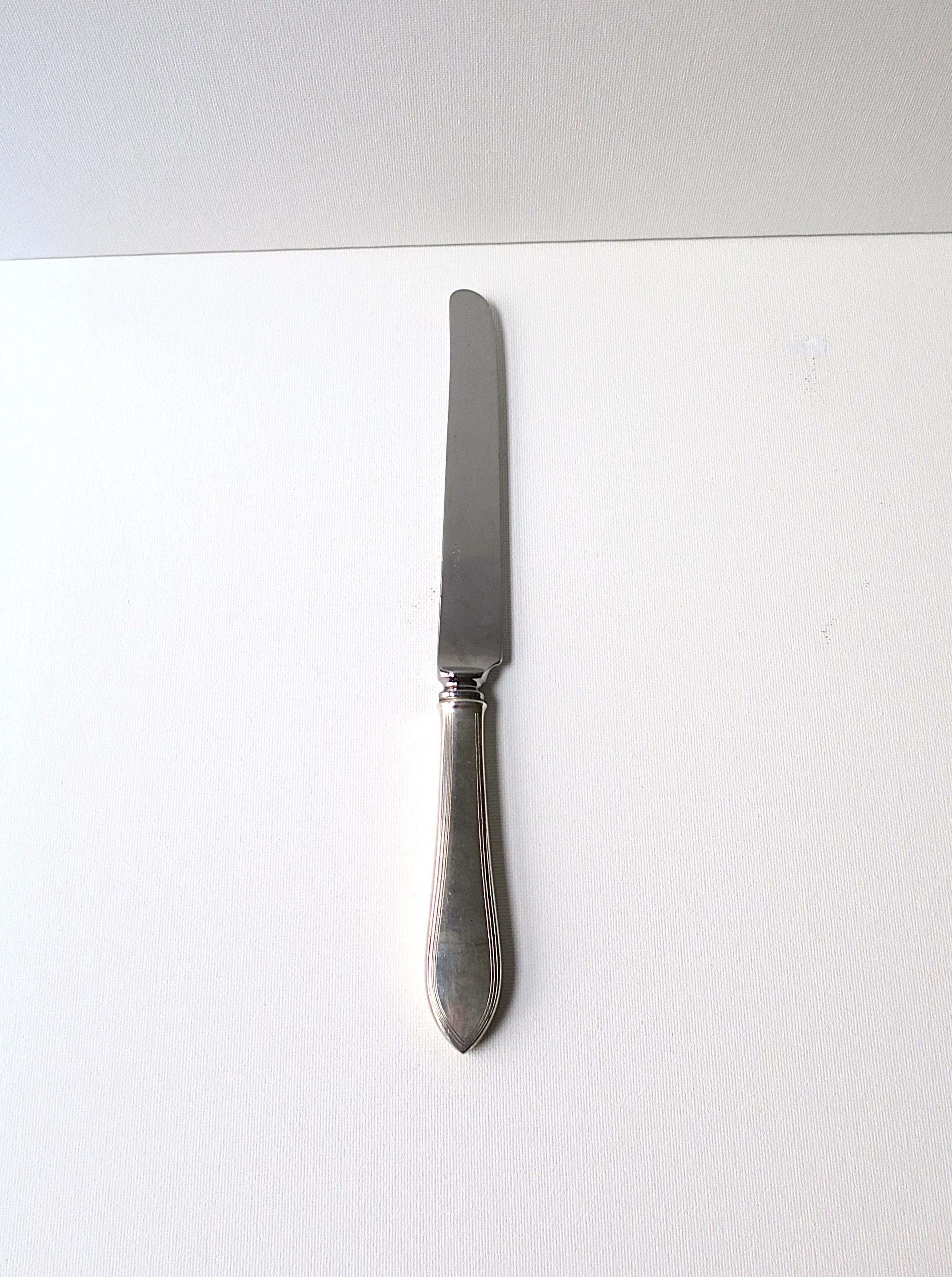 Coltello da pranzo Tiffany & Co. in argento e acciaio inossidabile, circa 20° secolo. Marcato 