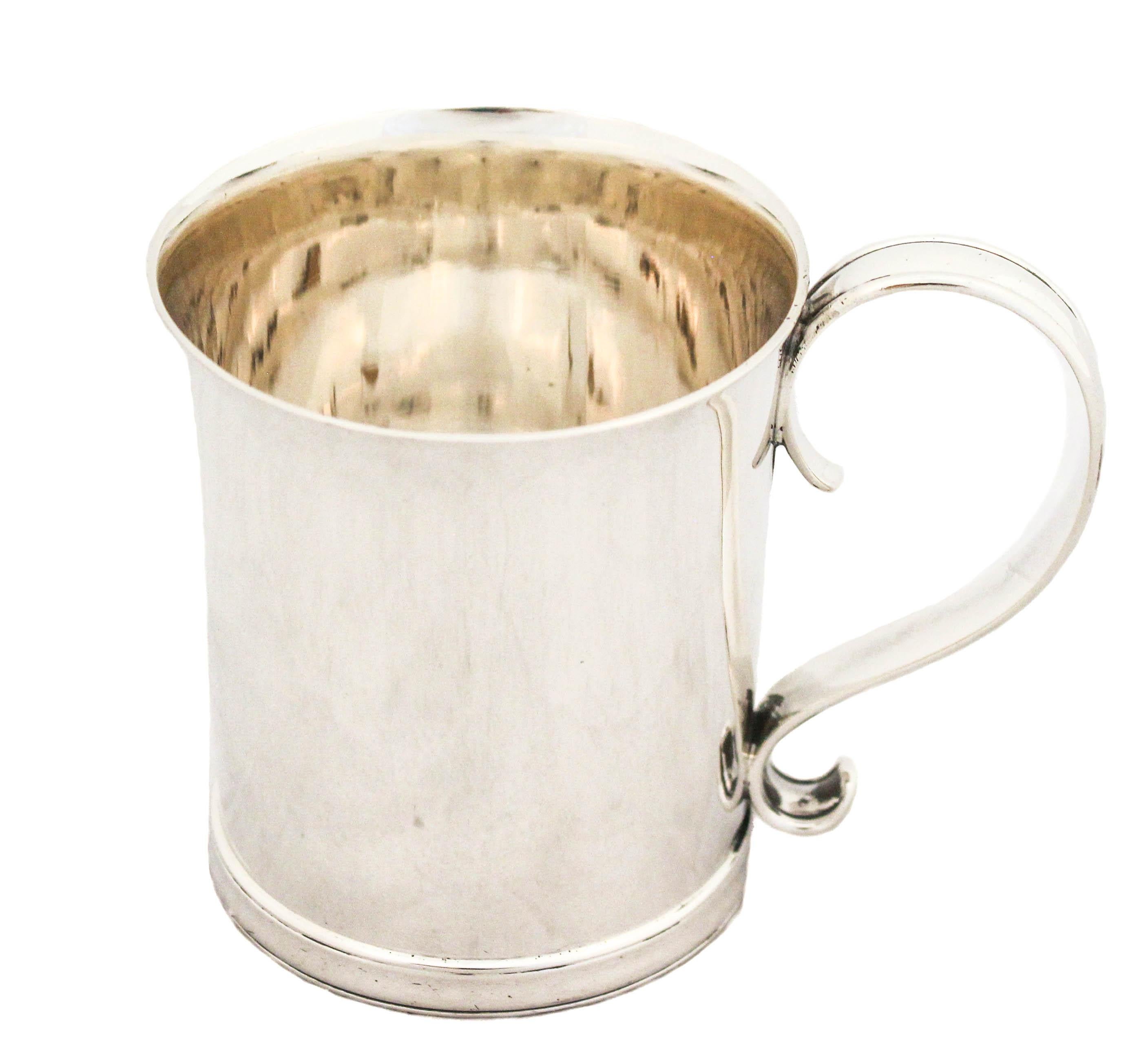 A sterling silver mug by the world renowned Tiffany and Company.  It is sleek, heavy and practical. Tea, coffee or even a beer— or all the above. 