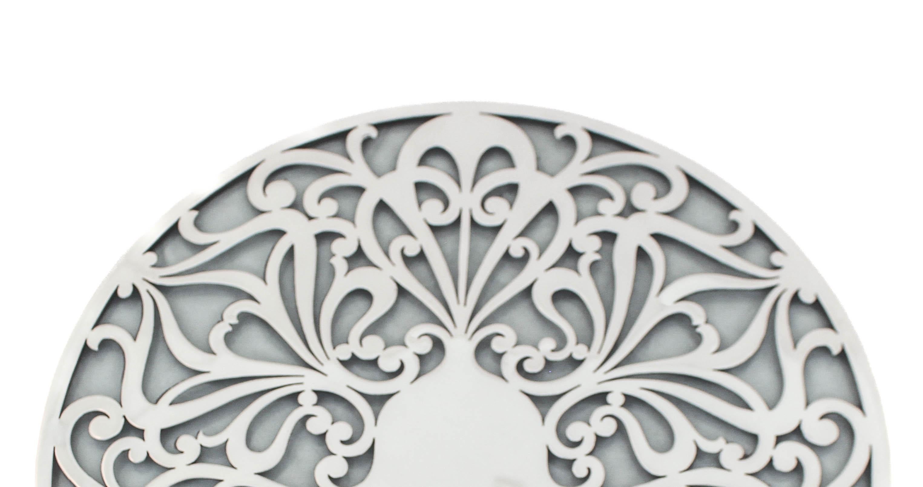 Being offered is an exceptionally large sterling silver trivet by the world renowned Tiffany & Company.  Designed in the Art Nouveau style it has a natural almost fluid-like design.  Using nature as inspiration it has an organic aesthetic and feel. 