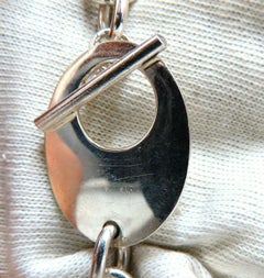 Bracciale con maglie a forma di cuore e chiusura a T in argento sterling*