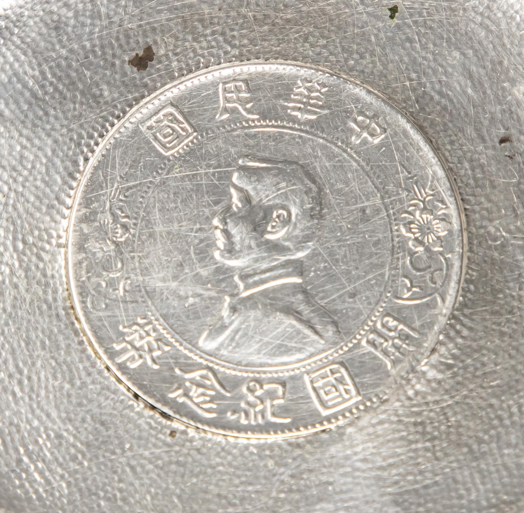 Offering this sterling silver Tuck Chang coin dish. The back is marked with Tuck Chang and their hallmark. The coin is Birth of the Republic of China.