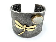 Sterling Silver Tufa Cast Cuff with 18K Gold Dragonfly & Opal by Philander Begay