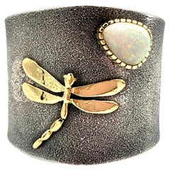 Sterling Silver Tufa Cast Cuff with 18K Gold Dragonfly & Opal by Philander Begay
