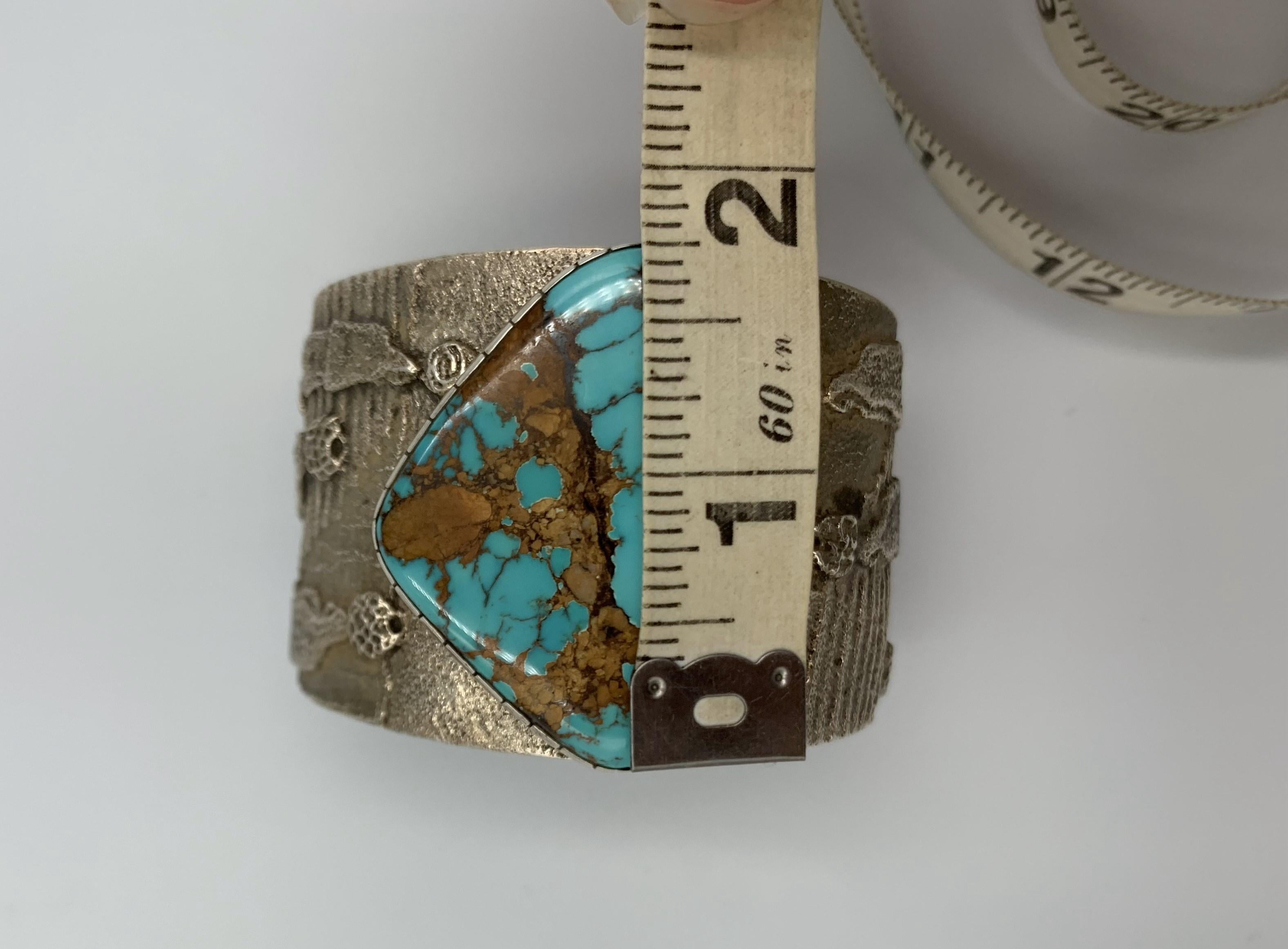 Sterling Silver tufa cast cuff with turquoise stone by Darryl and Rebecca Begay For Sale 1